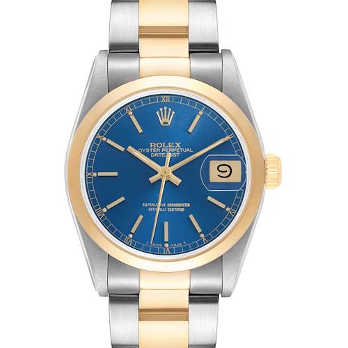 The Rolex Datejust 68243 Women's Steel and Gold (two tone) Blue Dial watch is shown from a top-down angle, displaying the blue dial, gold bezel, and two-tone bracelet prominently.