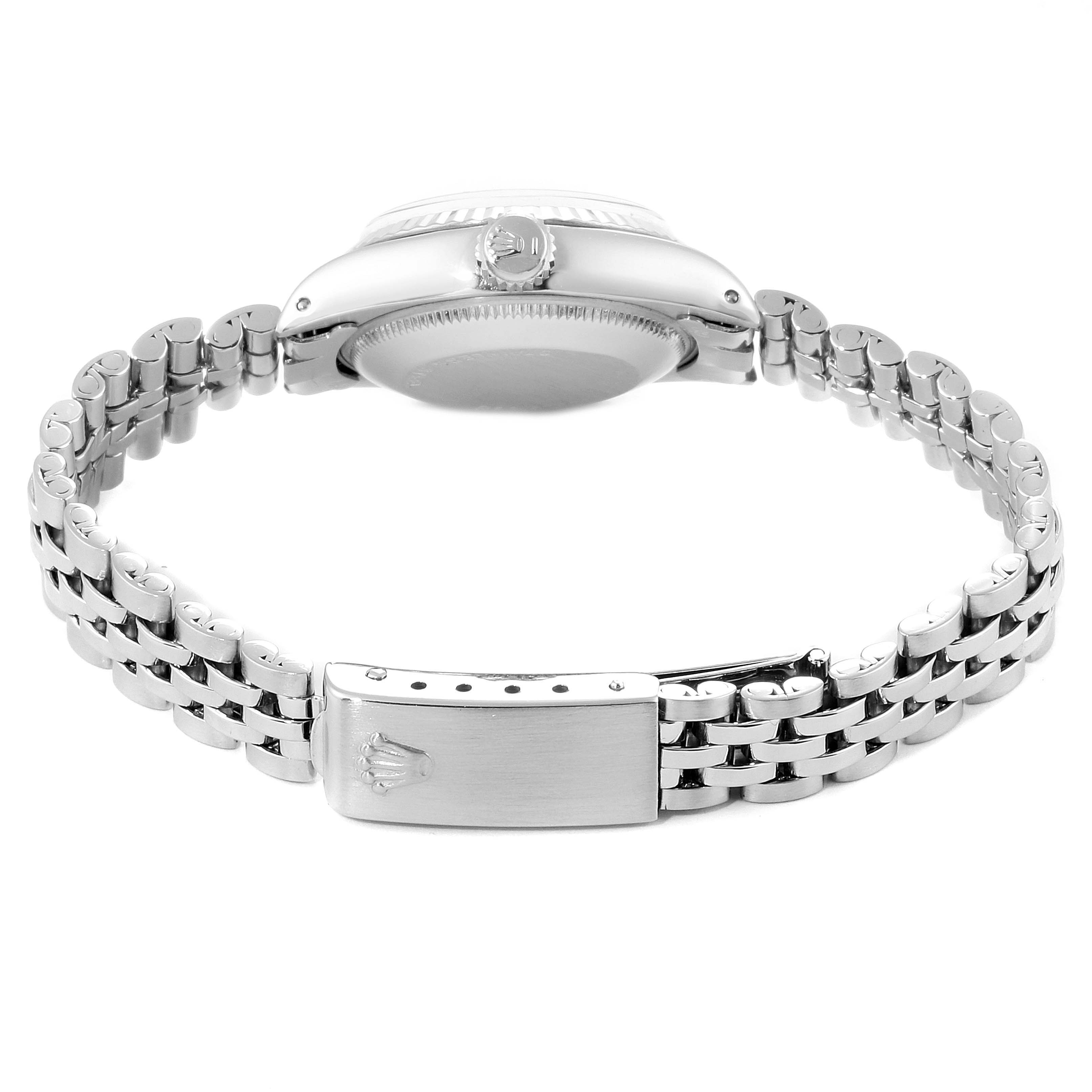 This image shows the back of a Rolex Datejust 6917 Women's Stainless Steel Silver Dial 6917 Women's Stainless Steel Silver Dial watch, focusing on its case back, the side view of the case, and the bracelet.