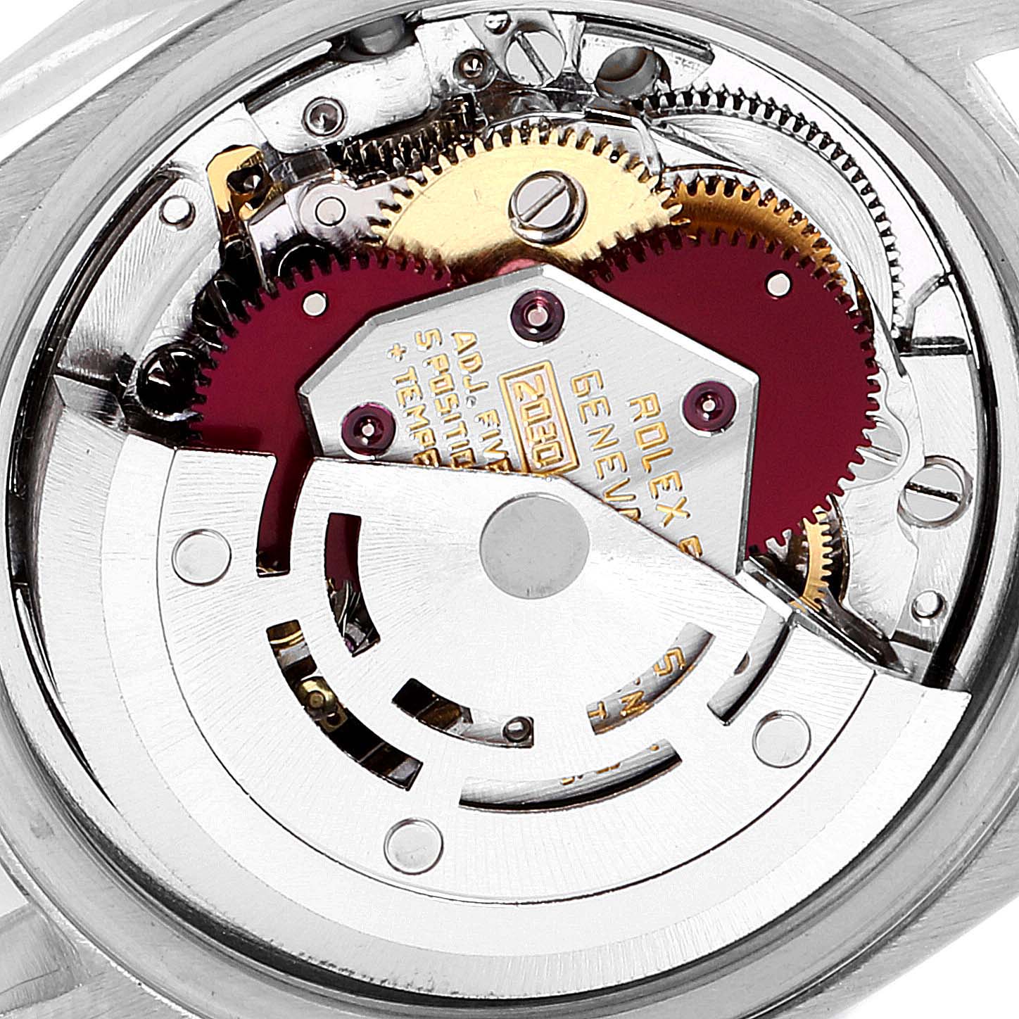 This image shows the intricate mechanical movement of the Rolex Datejust 6917 Women's Stainless Steel Silver Dial 6917 Women's Stainless Steel Silver Dial watch, focusing on the internal gears and components.