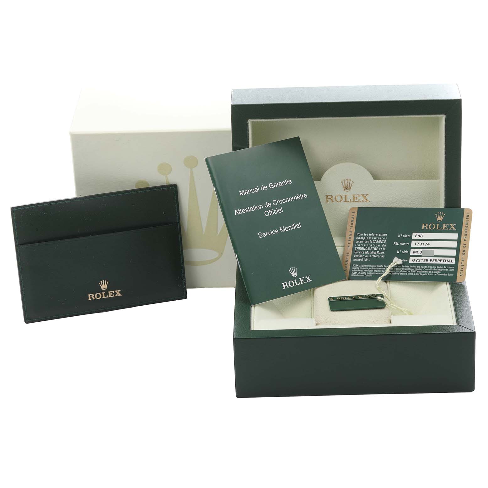 The image shows the packaging and accessories for a Rolex Datejust 179174 Women's Stainless Steel Mother of Pearl Dial 179174 Women's Stainless Steel Mother of Pearl Dial, including a box, warranty card, manual, and tag.