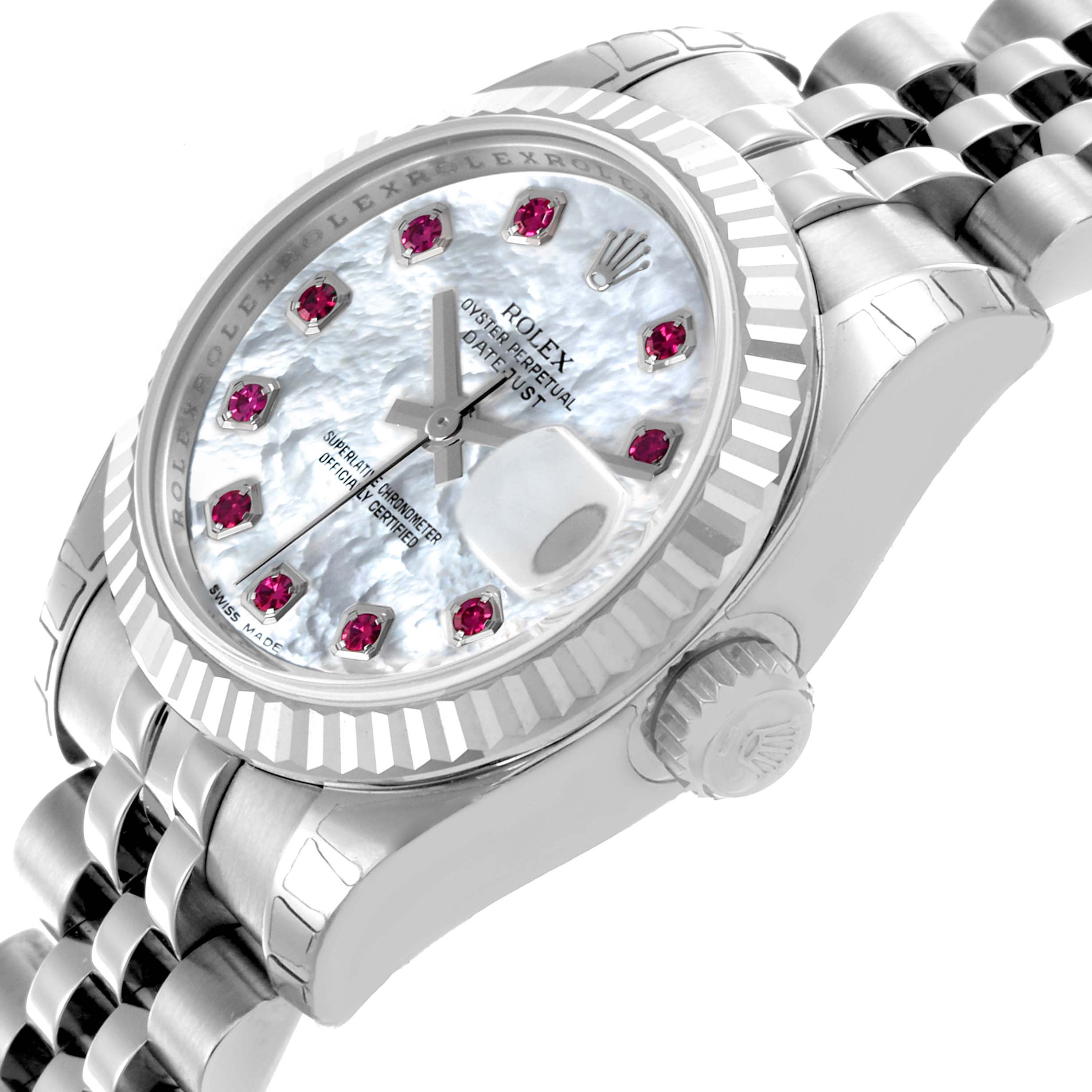 The Rolex Datejust 179174 Women's Stainless Steel Mother of Pearl Dial 179174 Women's Stainless Steel Mother of Pearl Dial is shown at a three-quarter angle, highlighting the dial, bezel, crown, and part of the bracelet.