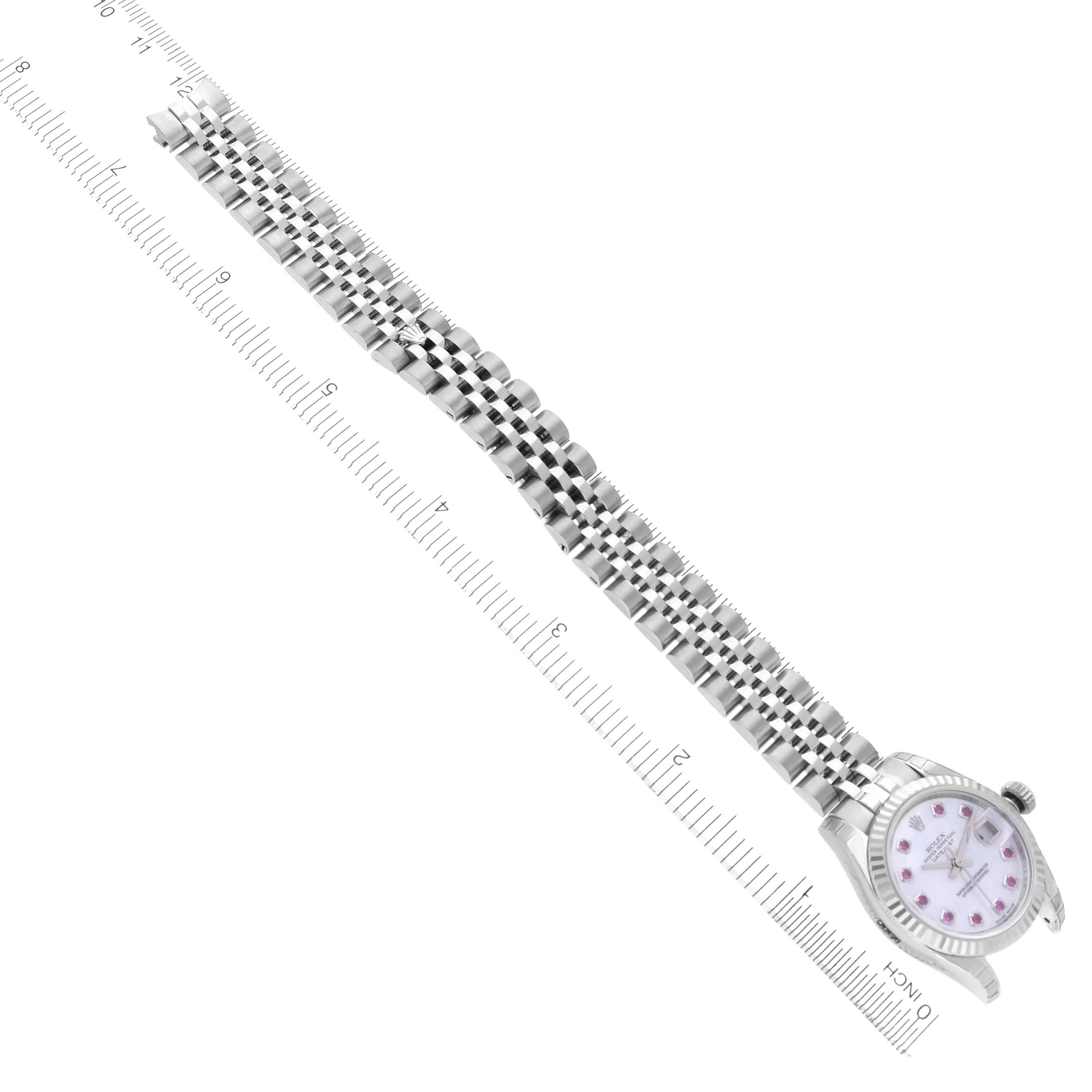 The Rolex Datejust 179174 Women's Stainless Steel Mother of Pearl Dial 179174 Women's Stainless Steel Mother of Pearl Dial watch is angled diagonally, showing the full bracelet and face with a subtle profile view.