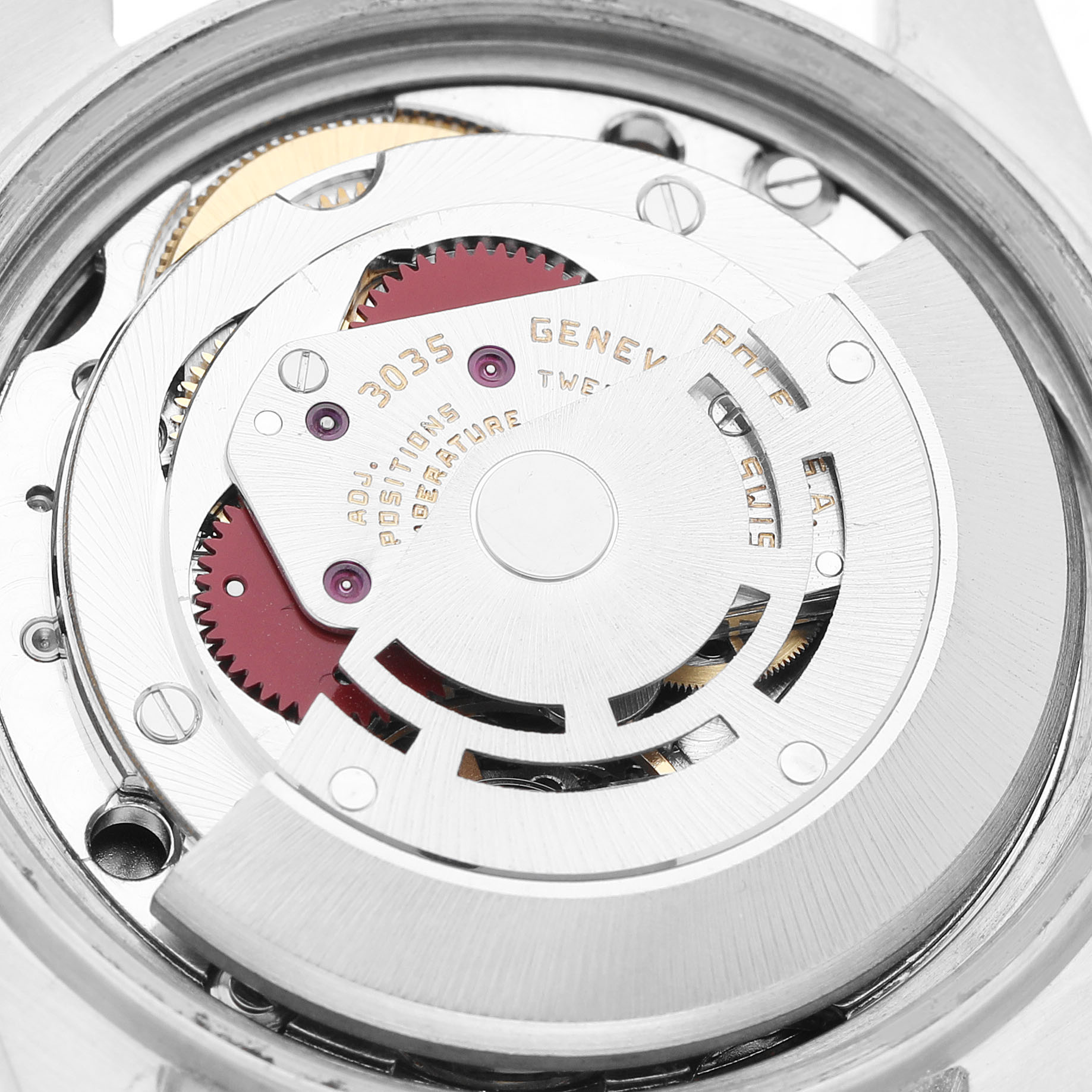 The image shows a close-up of the Rolex Datejust 16014 Men's Stainless Steel Silver Dial watch's movement and rotor from the back.