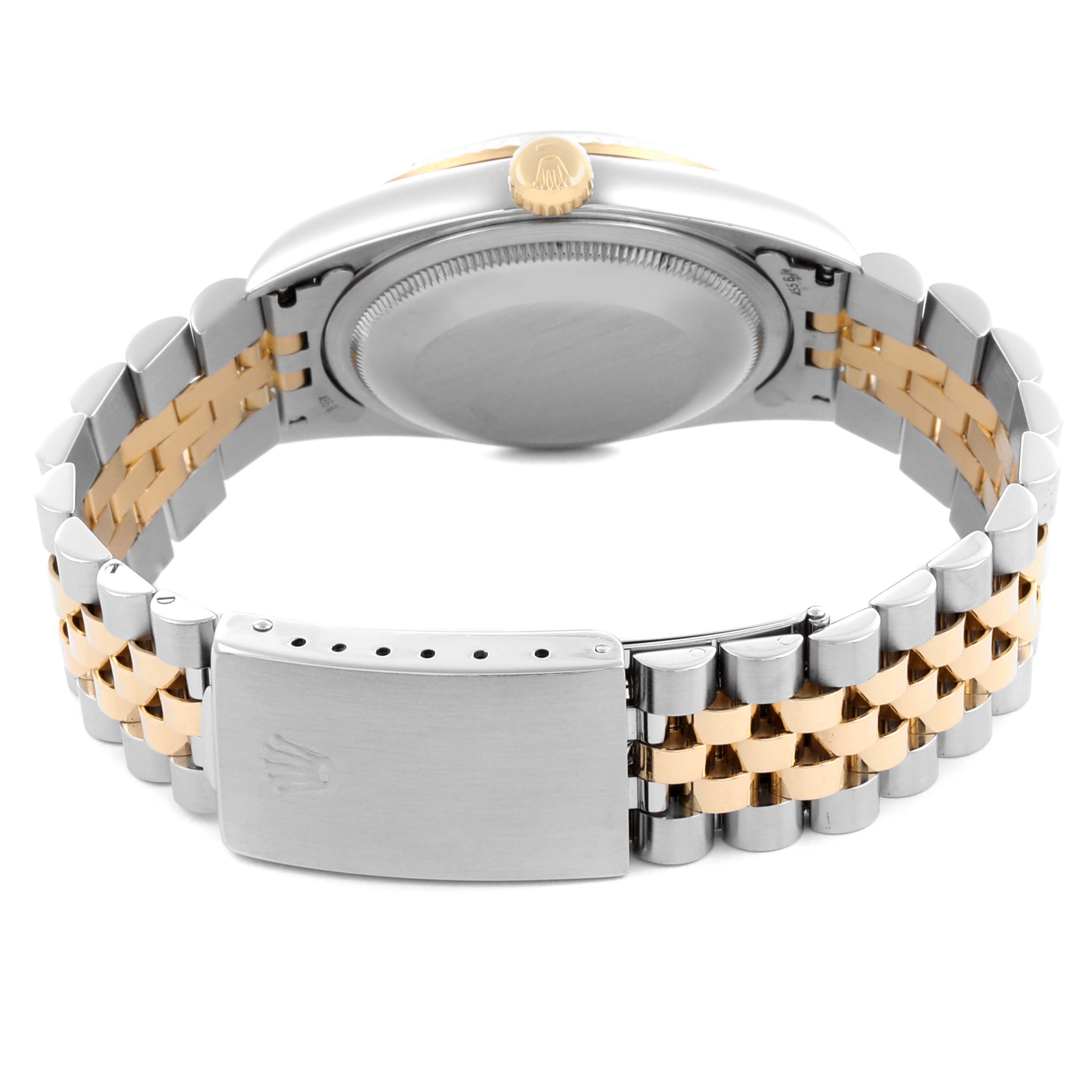 The image shows the back view of a Rolex Datejust 16233 Men's Steel and Gold (two tone) Black Dial 16233 Men's Steel and Gold (two tone) Black Dial, highlighting the case back, crown, and two-tone Jubilee bracelet.