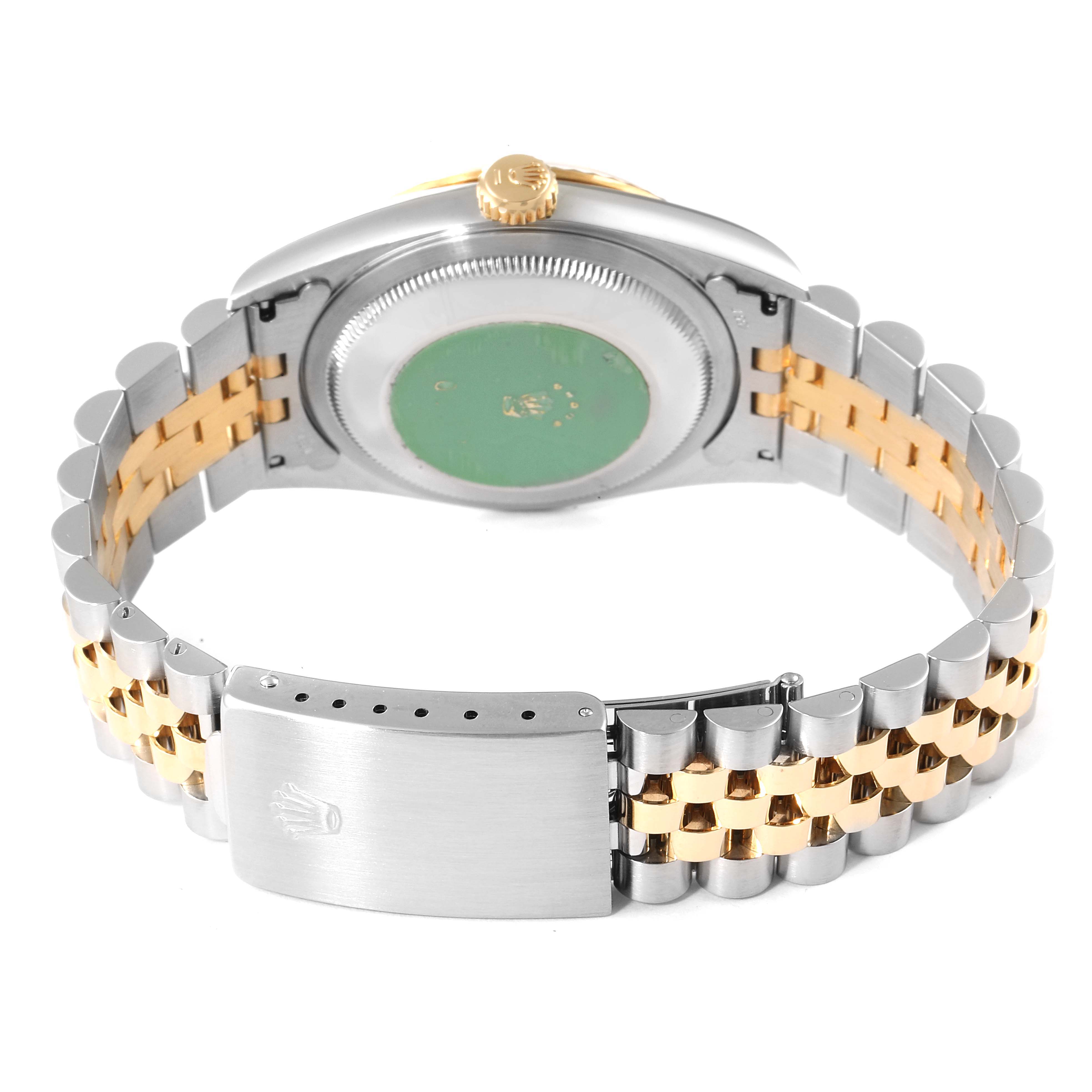 The image shows the back view and bracelet of a Rolex Datejust 16233 Men's Steel and Gold (two tone) Champagne Dial 16233 Men's Steel and Gold (two tone) Champagne Dial watch, highlighting the clasp and case back.