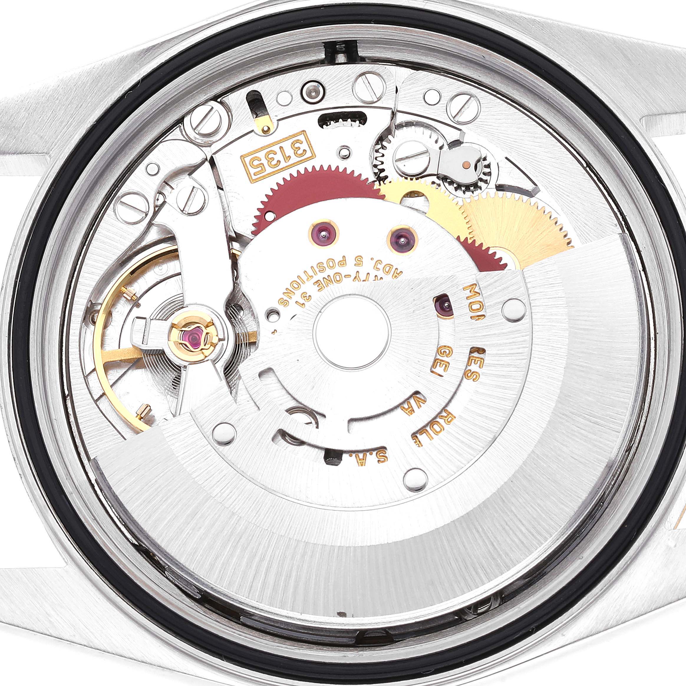 This image shows a close-up of the internal mechanical movement of a Rolex Datejust 16233 Men's Steel and Gold (two tone) Champagne Dial 16233 Men's Steel and Gold (two tone) Champagne Dial watch.