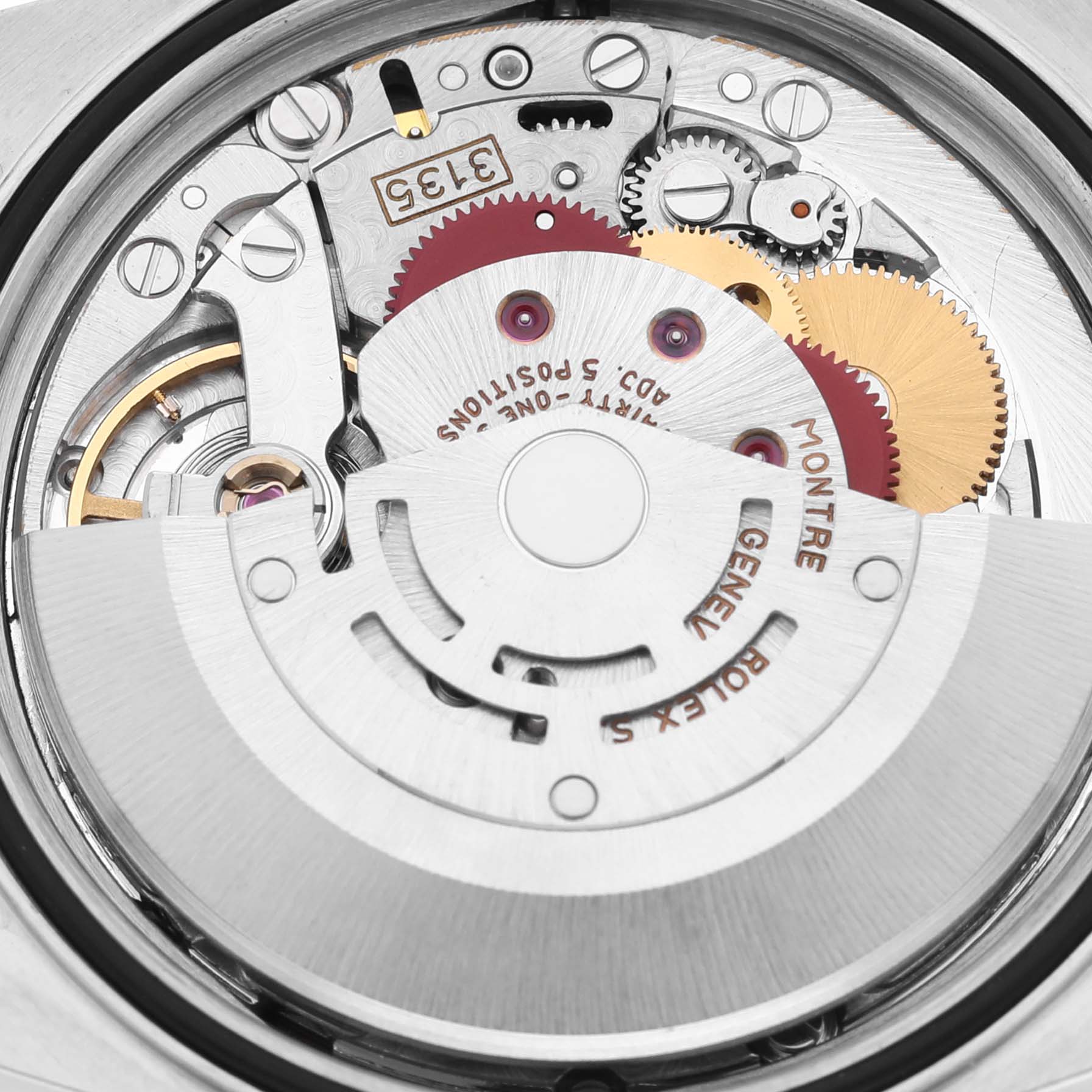 The image shows a close-up of the movement inside a Rolex Datejust 16233 Men
s Steel and Gold (two tone) Champagne Dial 16233 Men
s Steel and Gold (two tone) Champagne Dial watch, highlighting gears and intricate components.