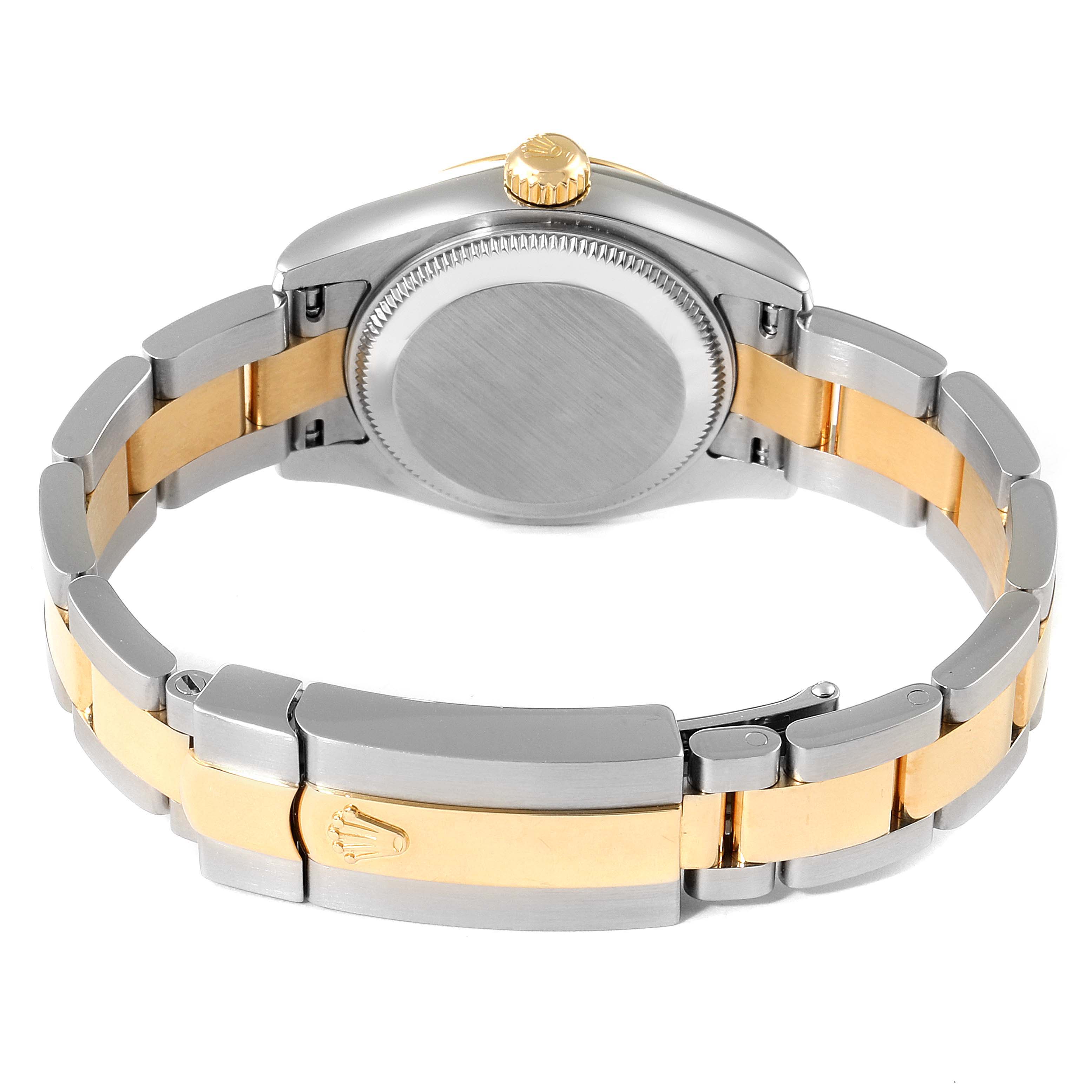 The image shows the back case and bracelet of a Rolex Datejust 179163 Women
s Steel and Gold (two tone) Grey Dial 179163 Women
s Steel and Gold (two tone) Grey Dial watch, featuring a two-tone metal design.