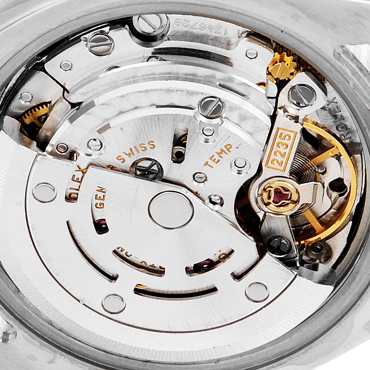 The image shows a close-up of the internal movement mechanism of a Rolex Datejust 179163 Women
s Steel and Gold (two tone) Grey Dial 179163 Women
s Steel and Gold (two tone) Grey Dial watch, specifically the caliber 2235.
