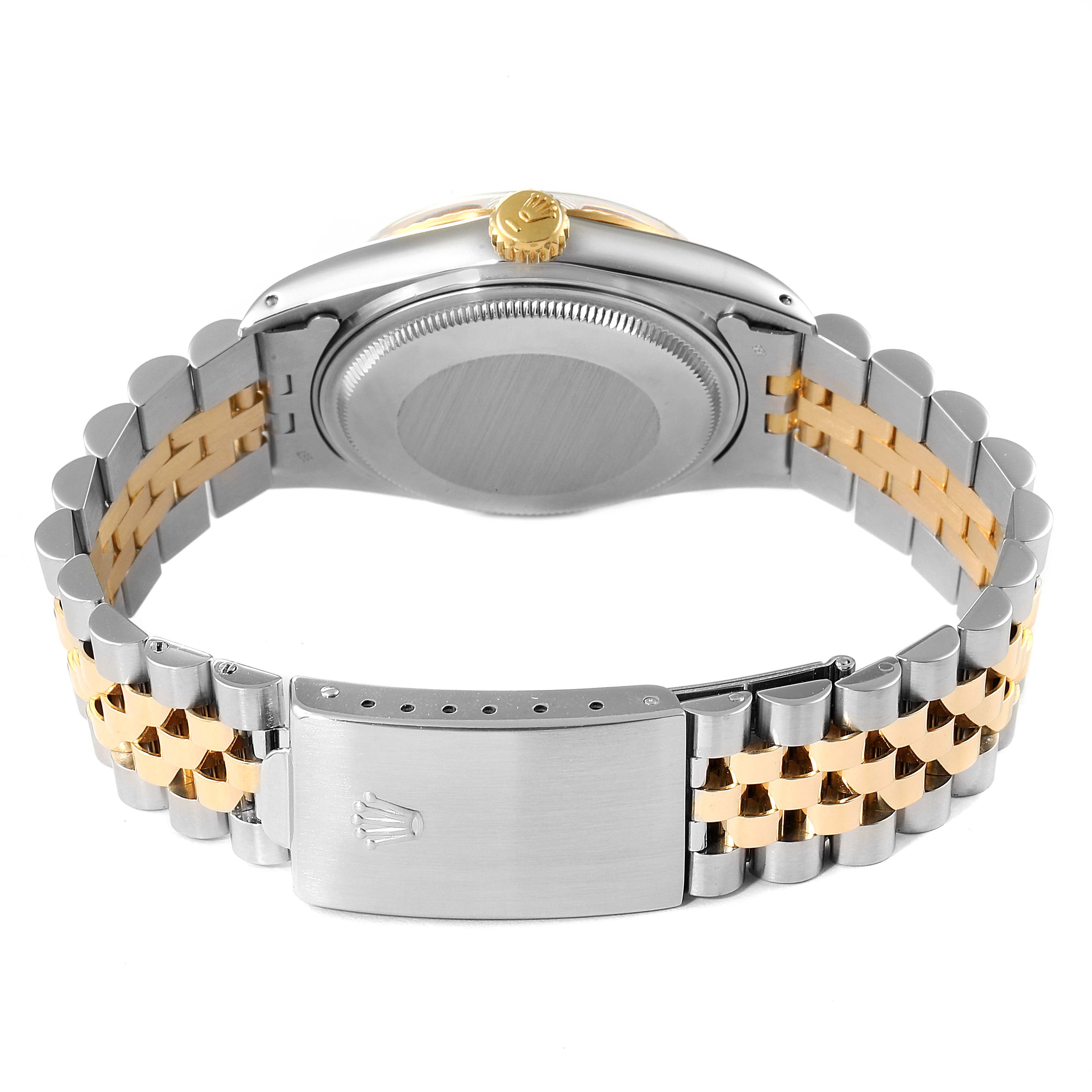 The image shows the back view of a Rolex Vintage Collection 16013 Men's Steel and Gold (two tone) White Dial 16013 Men's Steel and Gold (two tone) White Dial watch, highlighting its two-tone bracelet and clasp.