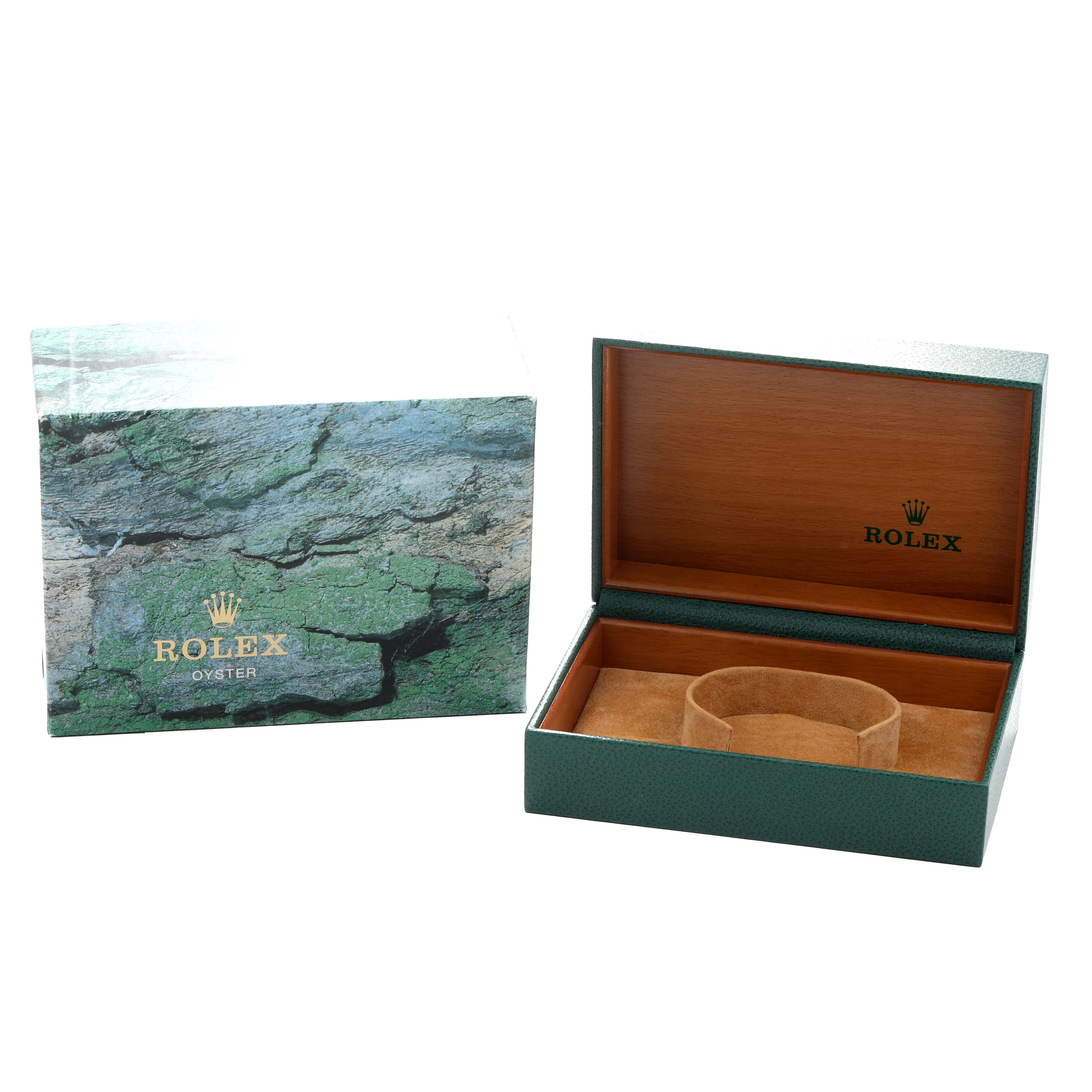 The image shows a Rolex Datejust 16233 Men
s Steel and Gold (two tone) White Dial box and packaging, including the green outer box and open wooden interior box with a watch holder.