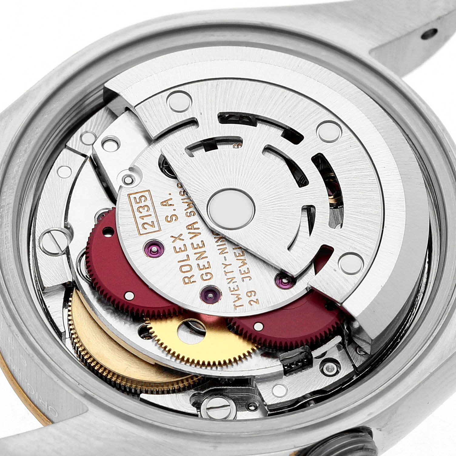 The image shows the intricate movement and rotor mechanism of the Rolex Datejust 69173 Women's Steel and Gold (two tone) White Dial watch.