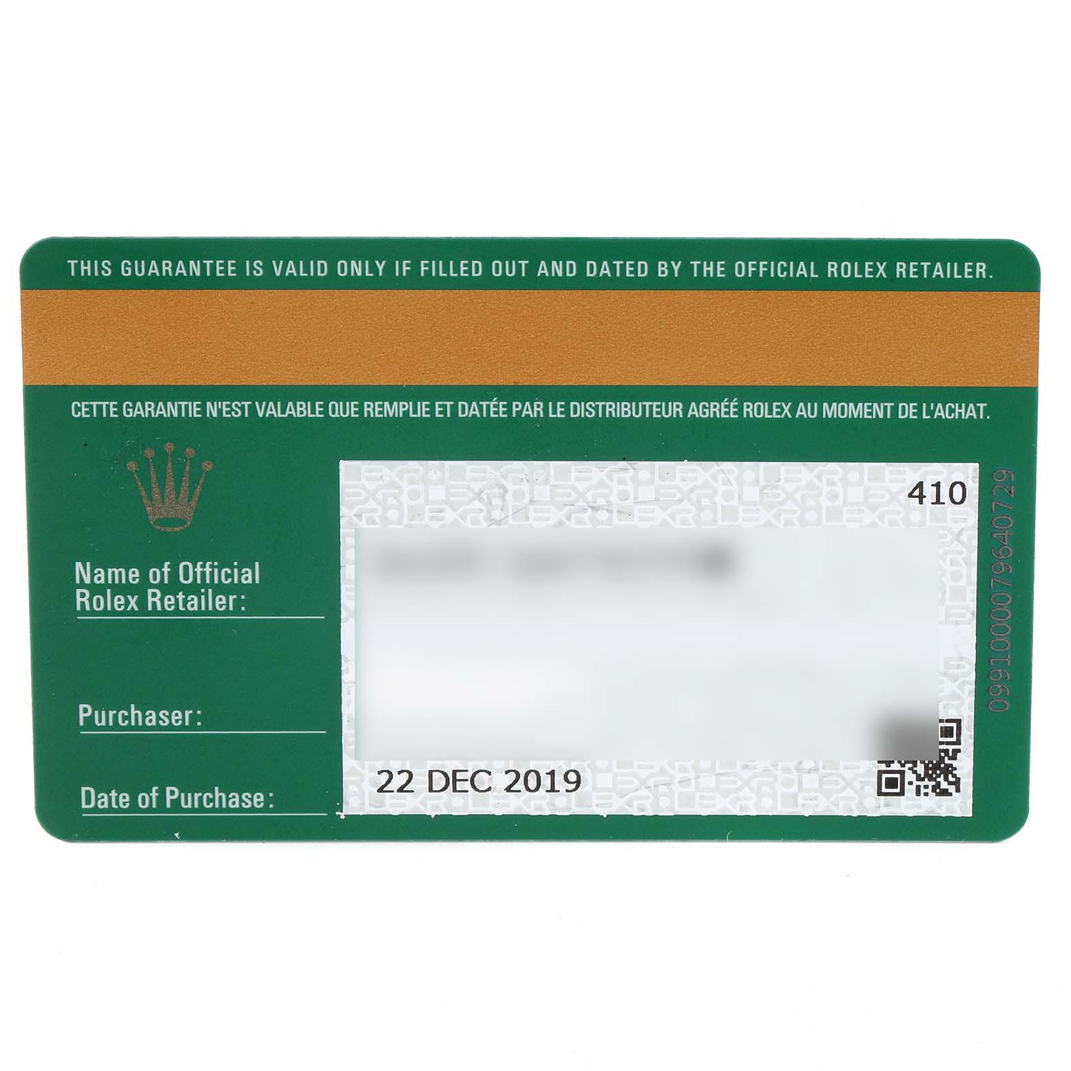 The image shows a close-up of a warranty card for a Rolex Daytona 116500 Men
s Stainless Steel White Dial 116500 Men
s Stainless Steel White Dial watch, displaying retailer and purchase date information.