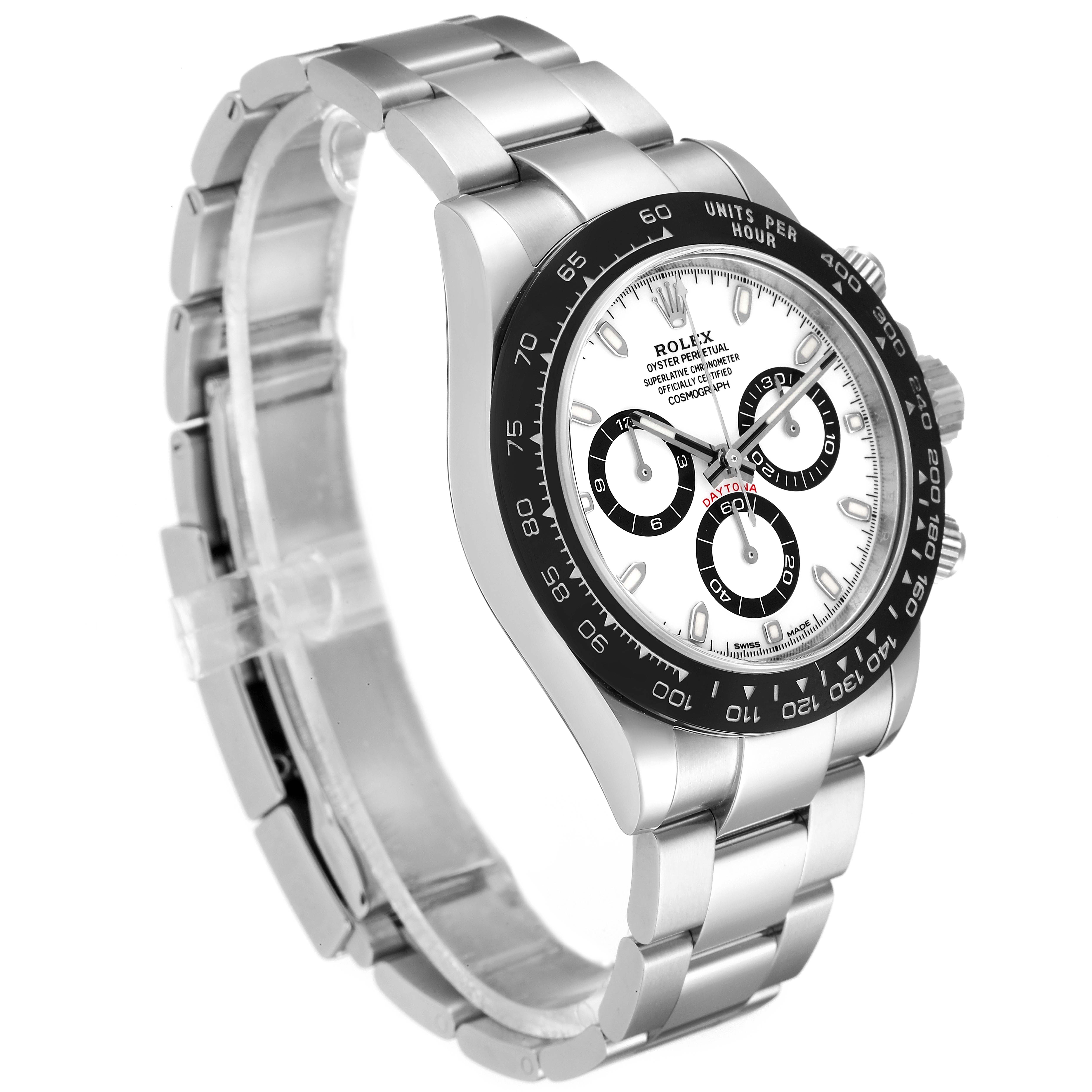The image shows a Rolex Daytona 116500 Men's Stainless Steel White Dial 116500 Men's Stainless Steel White Dial watch from a front-left angle, highlighting its band, bezel, and face.