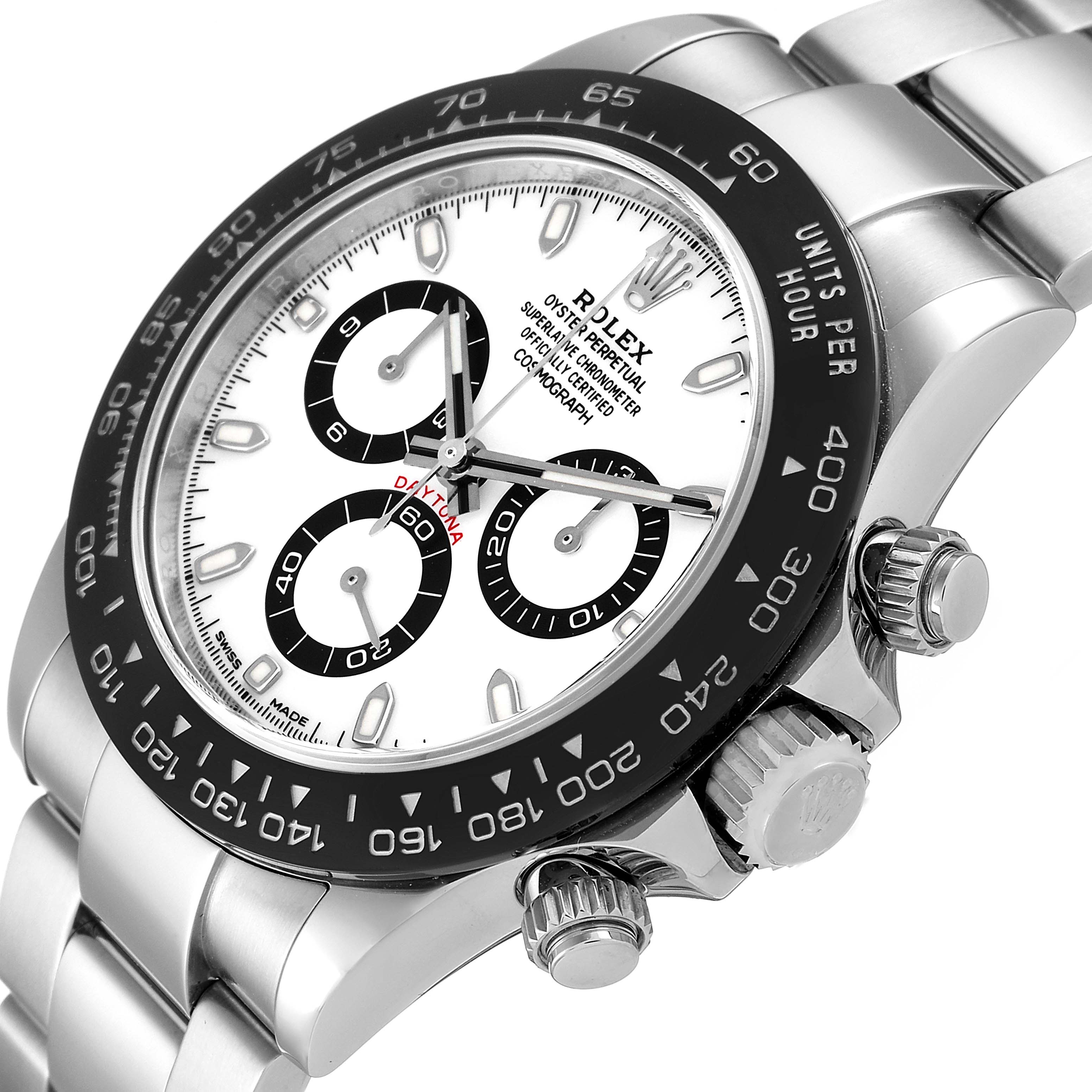 The image shows a close-up of the dial, bezel, and crown of the Rolex Daytona 116500 Men's Stainless Steel White Dial 116500 Men's Stainless Steel White Dial watch model.