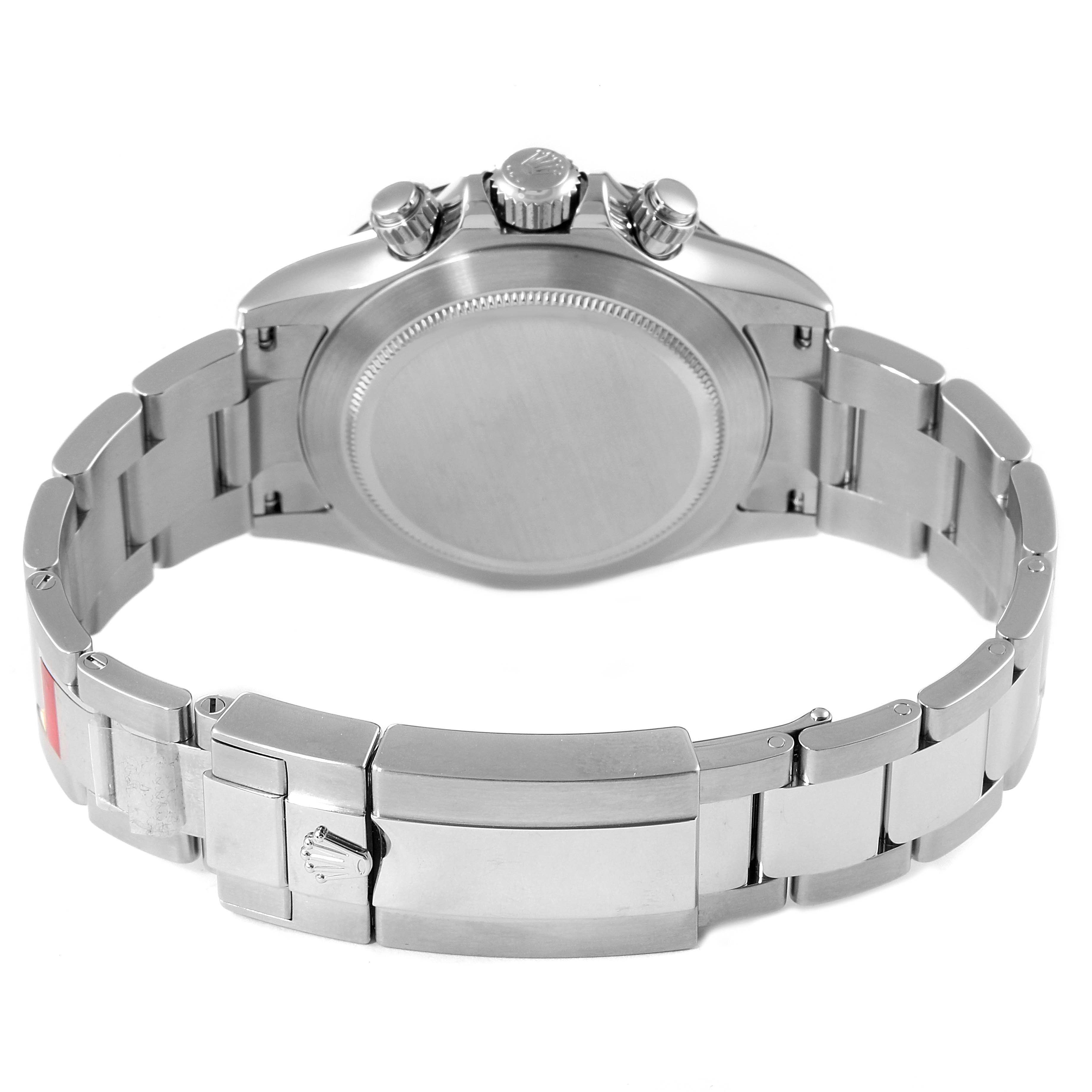 The image shows the Rolex Daytona 116500 Men's Stainless Steel White Dial 116500 Men's Stainless Steel White Dial watch from the back, highlighting its closed clasp and stainless steel bracelet.