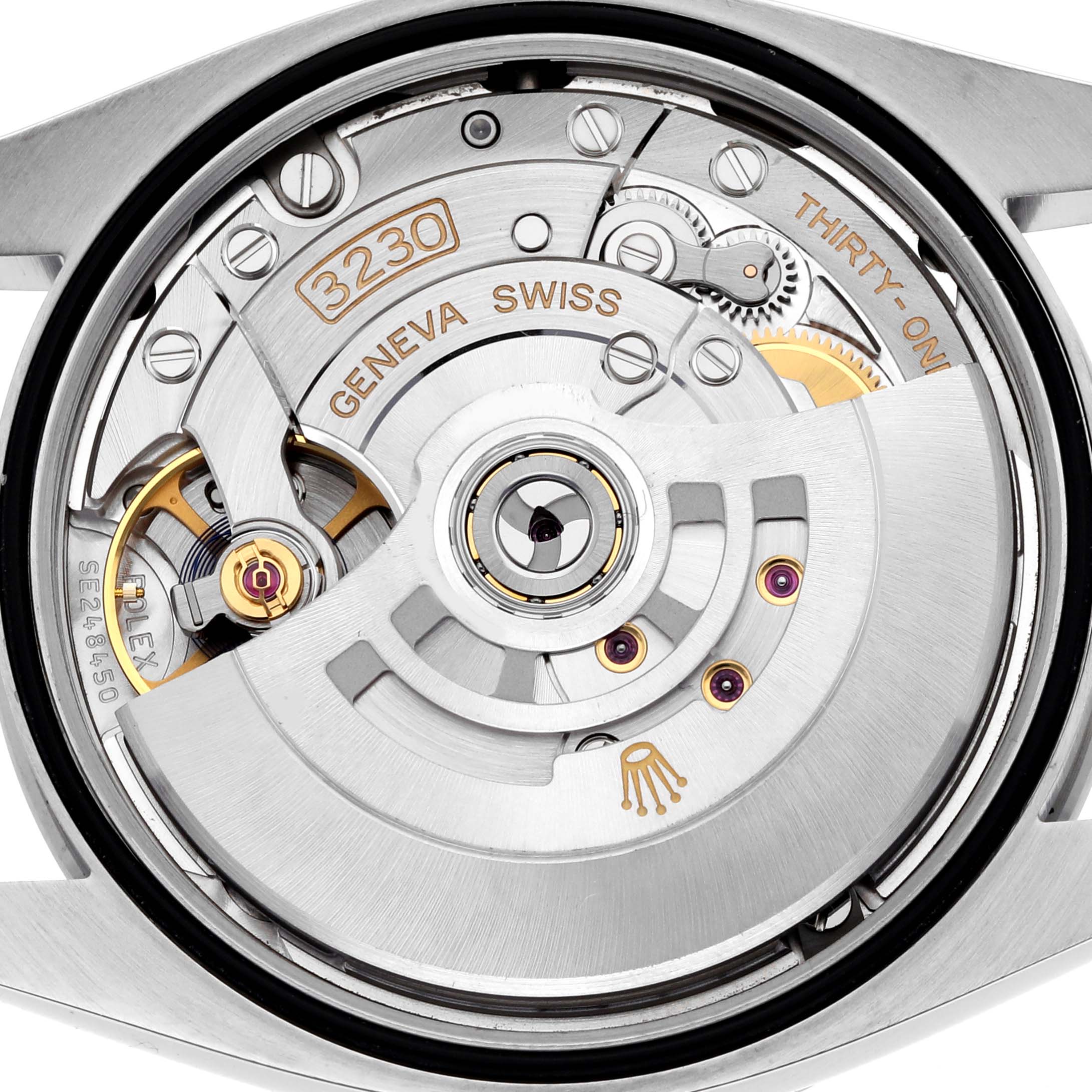 The image shows the movement of a Rolex Explorer 124270 Men
s Stainless Steel Black Dial watch, focusing on the rotor and internal components from a top-down angle.