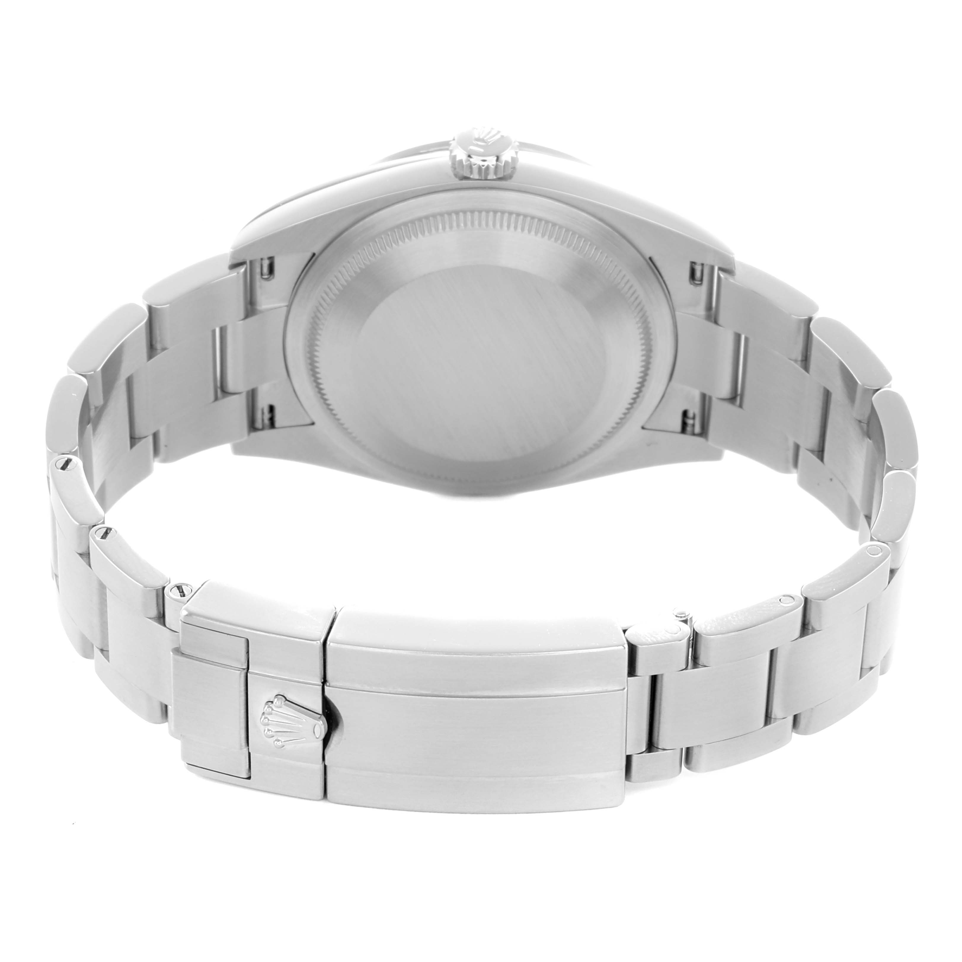 The image shows the back and clasp of a Rolex Explorer 124270 Men
s Stainless Steel Black Dial watch, highlighting the bracelet and case back.