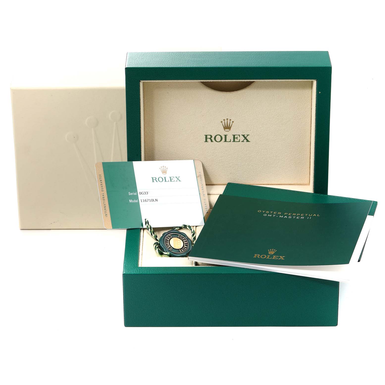 This image shows a Rolex GMT-Master 116710 Men
s Stainless Steel Black Dial 116710 Men
s Stainless Steel Black Dial watch box, warranty card, hang tag, and manuals from a front angle.