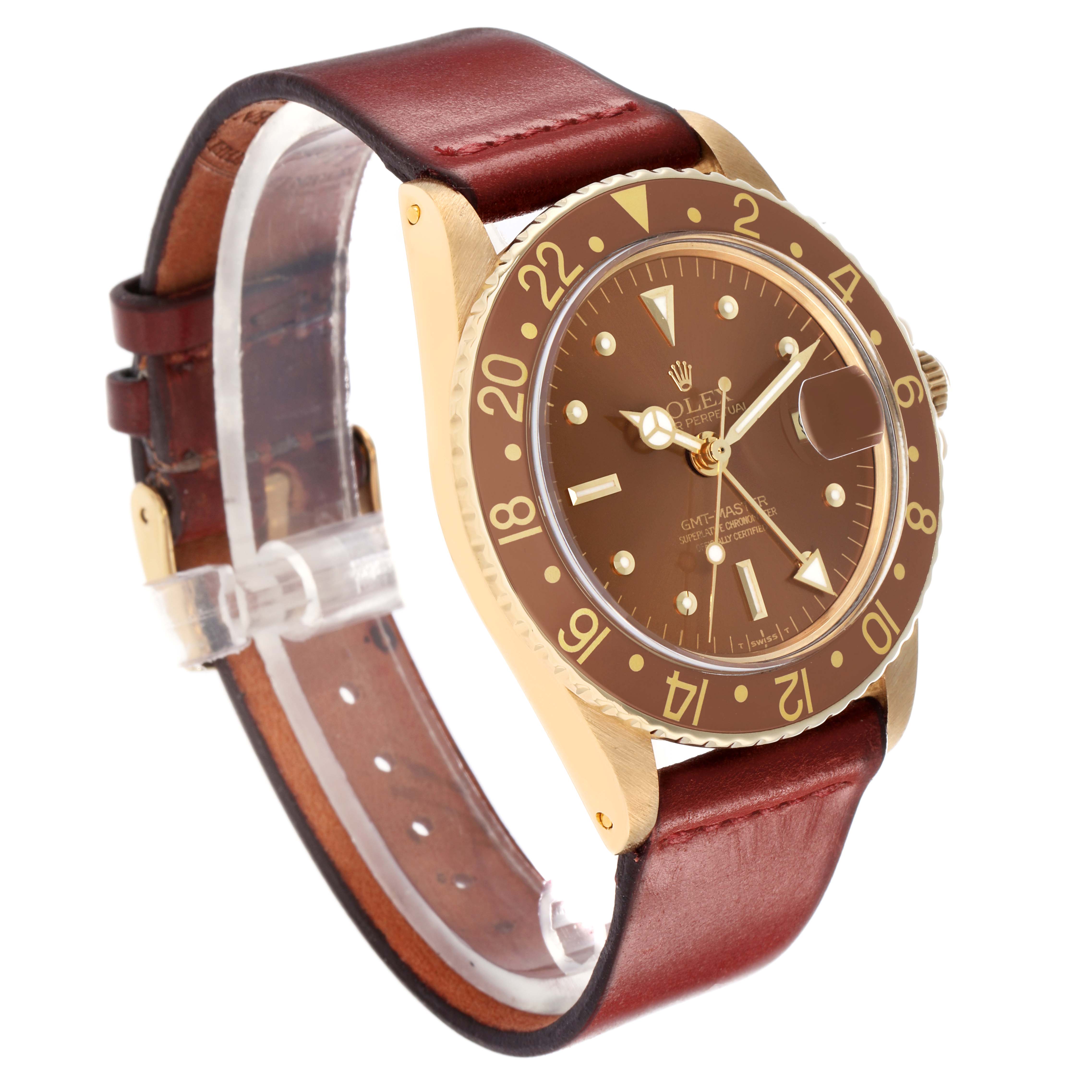 The Rolex GMT-Master 1675 Men
s Yellow Gold Brown Dial watch is shown at a three-quarter angle, highlighting the bezel, dial, and leather strap.