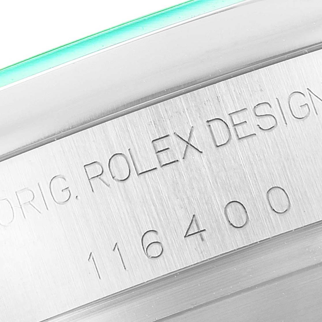 The image shows a close-up of the engraved case side of a Rolex Milgauss 116400GV Men's Stainless Steel Blue Dial 116400GV Men's Stainless Steel Blue Dial, highlighting the model number 116400 and the brand name.