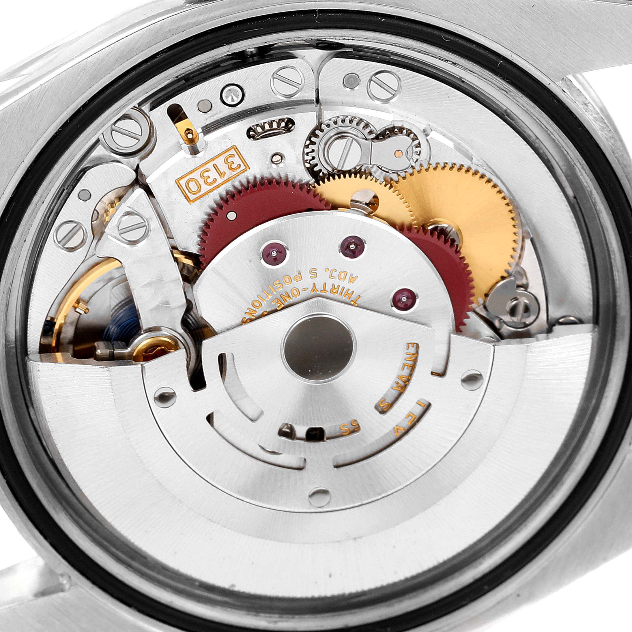 The image shows the internal mechanism of a Rolex Oyster Perpetual 116000 Men's Stainless Steel Silver Dial 116000 Men's Stainless Steel Silver Dial watch from a close-up, rear angle.