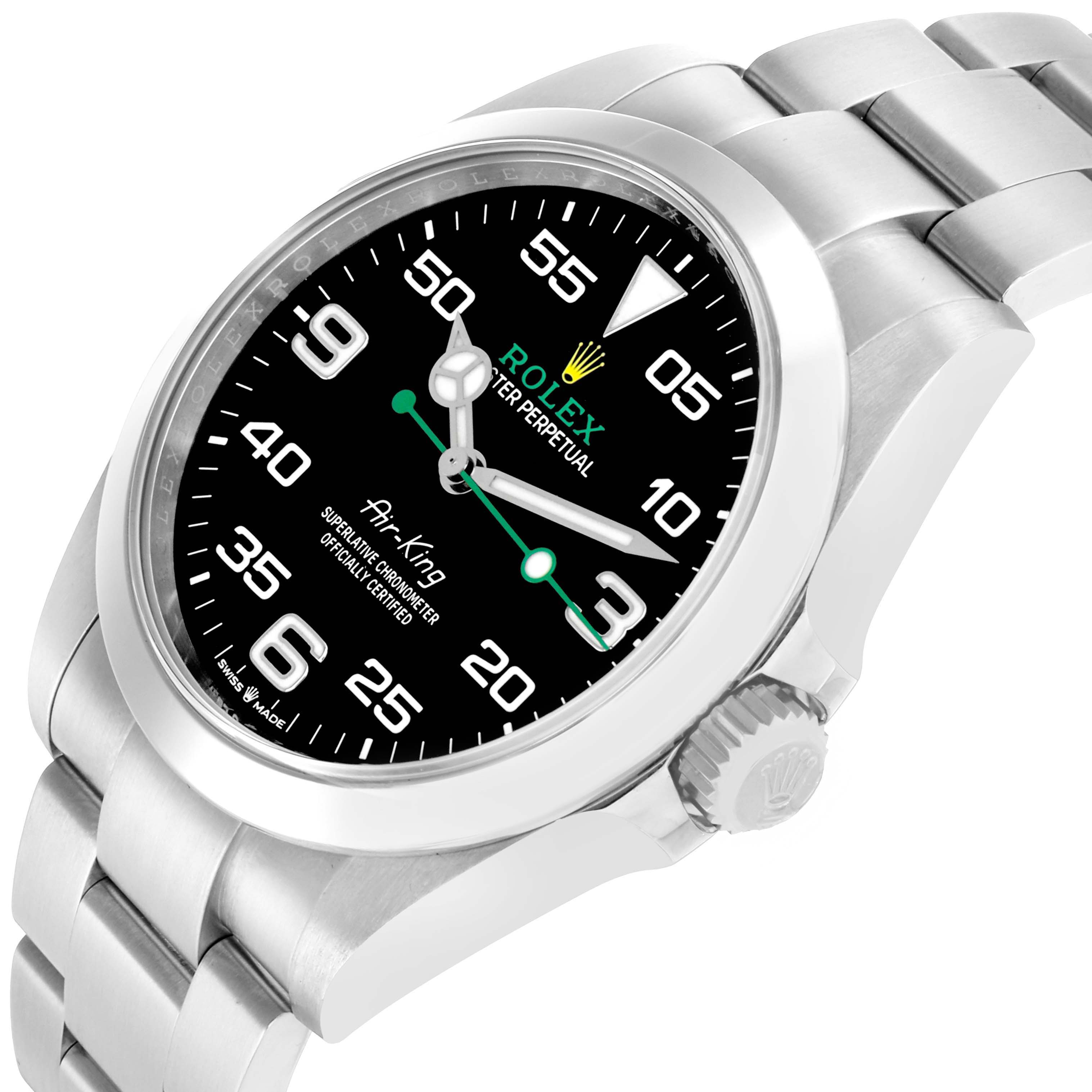 The image shows a Rolex Air-King 126900 Men
s Stainless Steel Black Dial watch from an angled view, highlighting the dial, crown, and part of the bracelet.