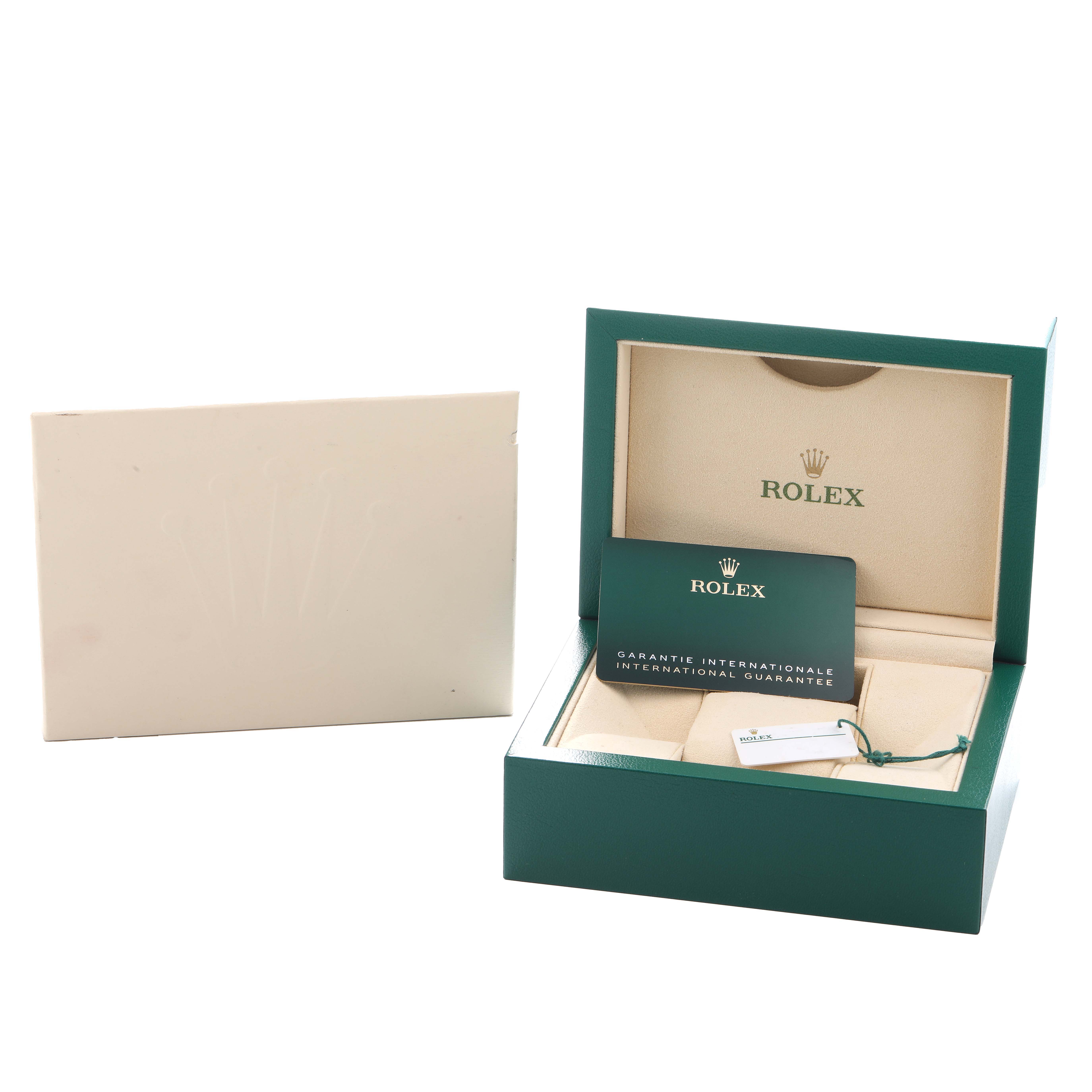The image shows the open box and warranty card for the Rolex Air-King 126900 Men
s Stainless Steel Black Dial watch.