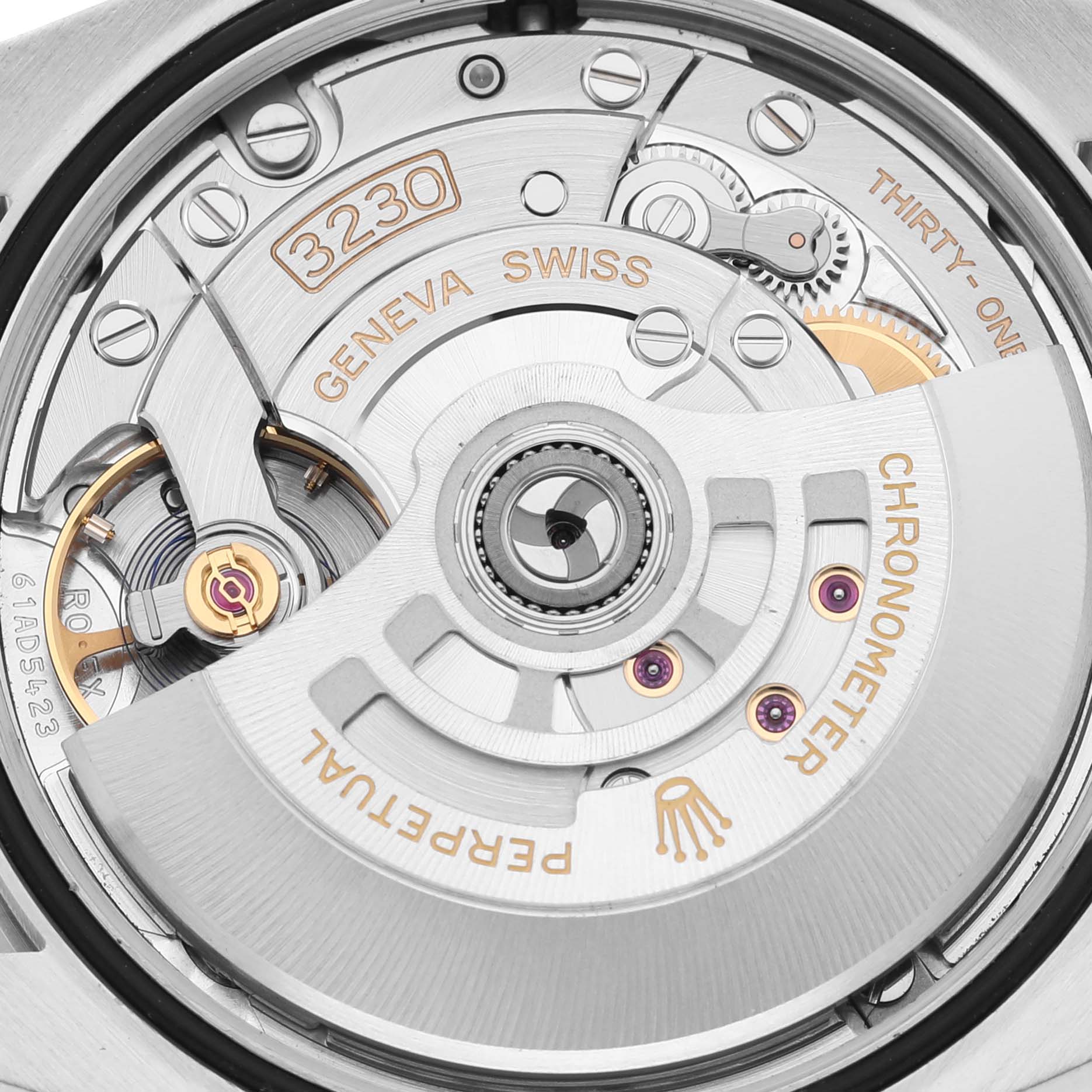 The image shows the intricate movement of a Rolex Oyster Perpetual 126000 Men
s Stainless Steel Blue Dial 126000 Men
s Stainless Steel Blue Dial watch from a top-down angle.