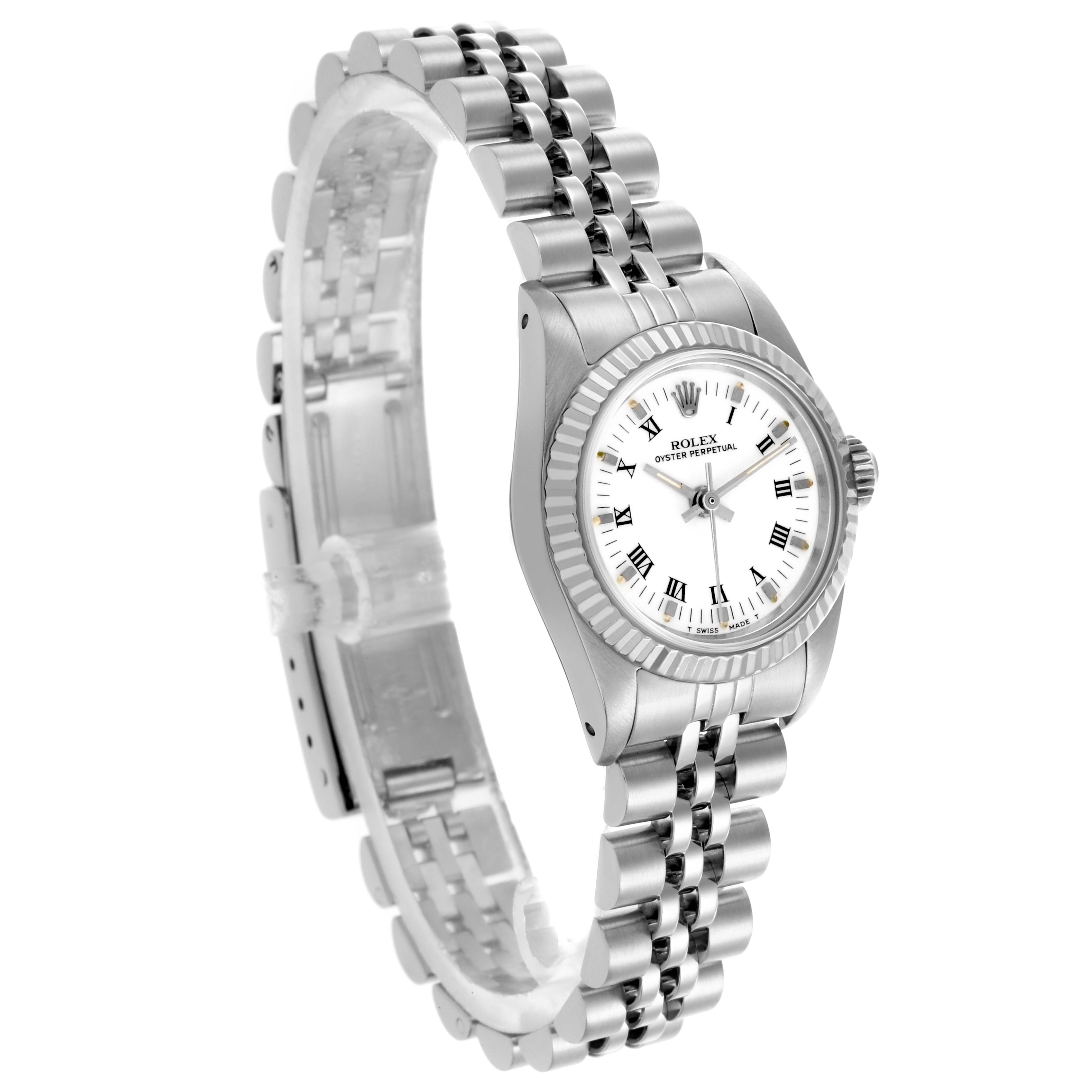 The Rolex Oyster Perpetual 67194 Women's Stainless Steel White Dial 67194 Women's Stainless Steel White Dial watch is shown at a three-quarter angle, displaying its face and bracelet.