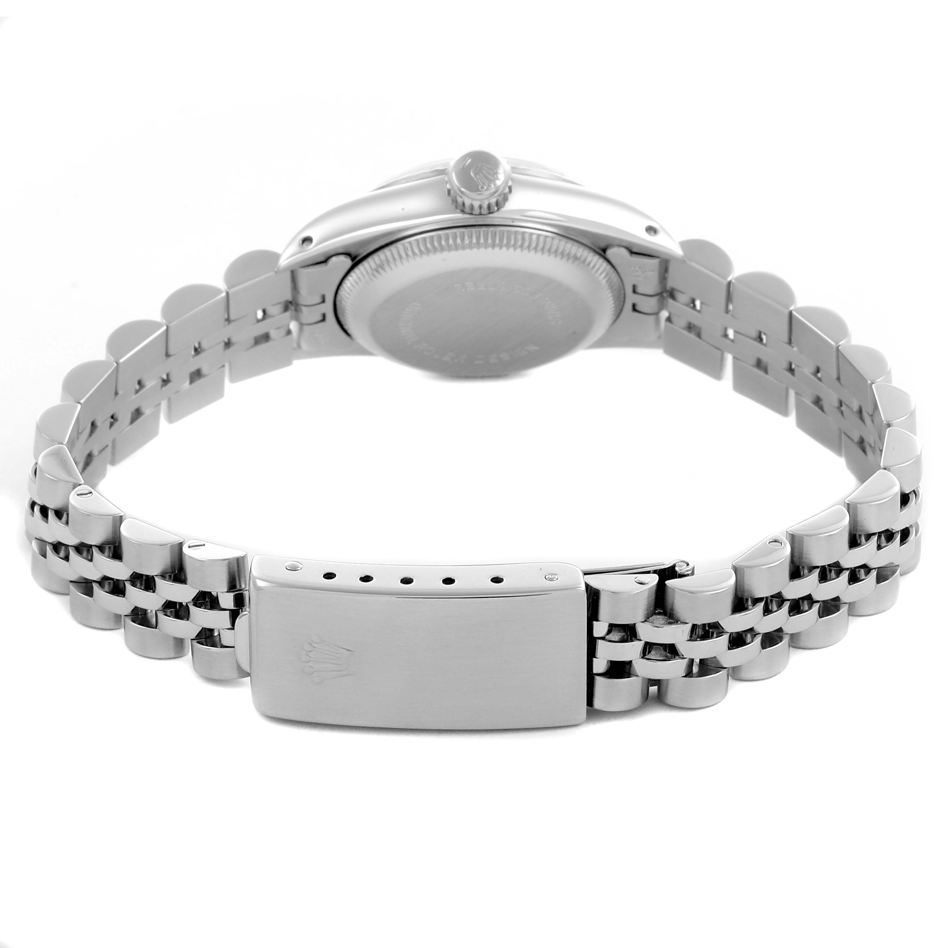 The image shows the back and side of the Rolex Oyster Perpetual 67194 Women's Stainless Steel White Dial 67194 Women's Stainless Steel White Dial, highlighting the clasp, bracelet, and case back.