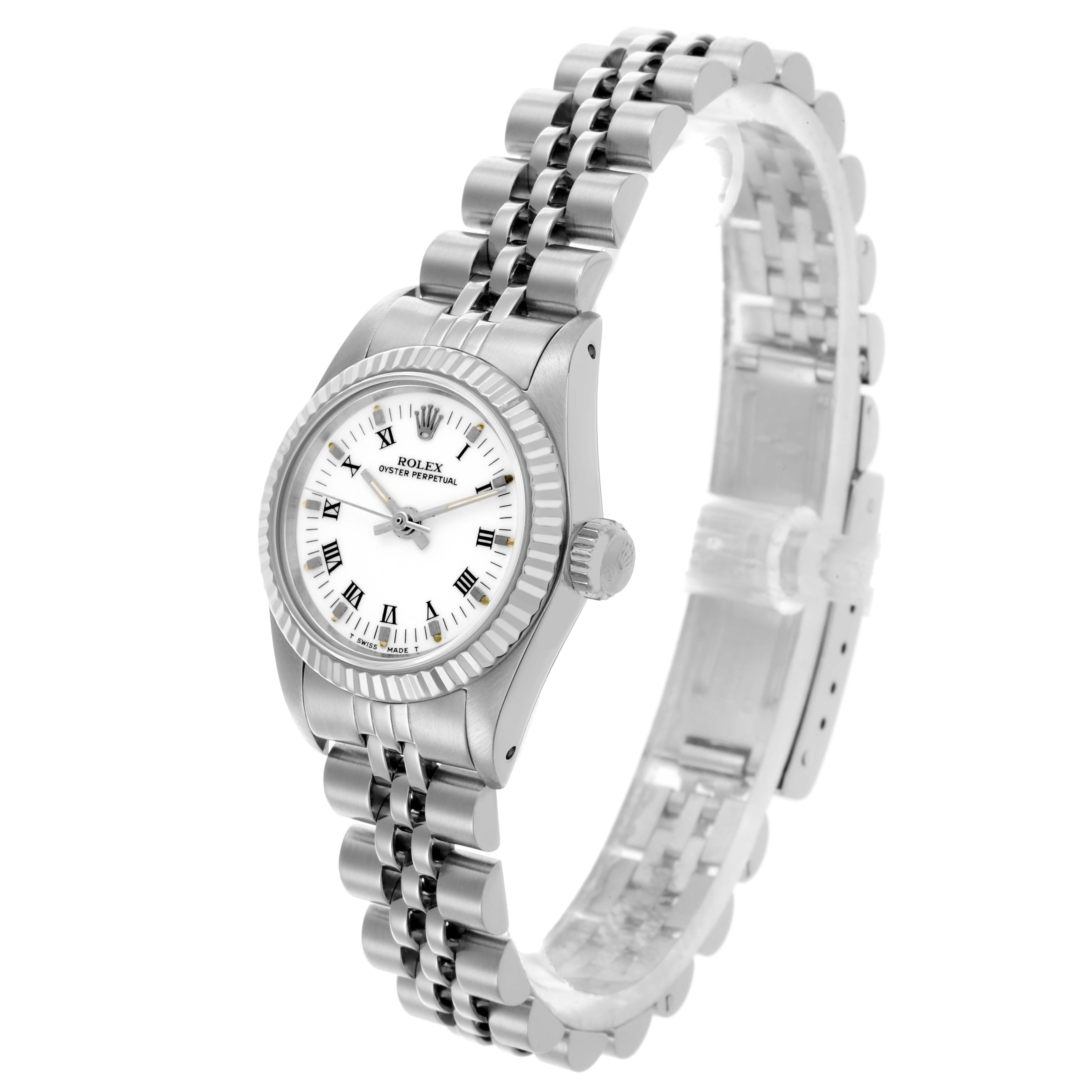 The Rolex Oyster Perpetual 67194 Women's Stainless Steel White Dial 67194 Women's Stainless Steel White Dial watch is shown at a three-quarter angle, highlighting the face, bezel, and bracelet.