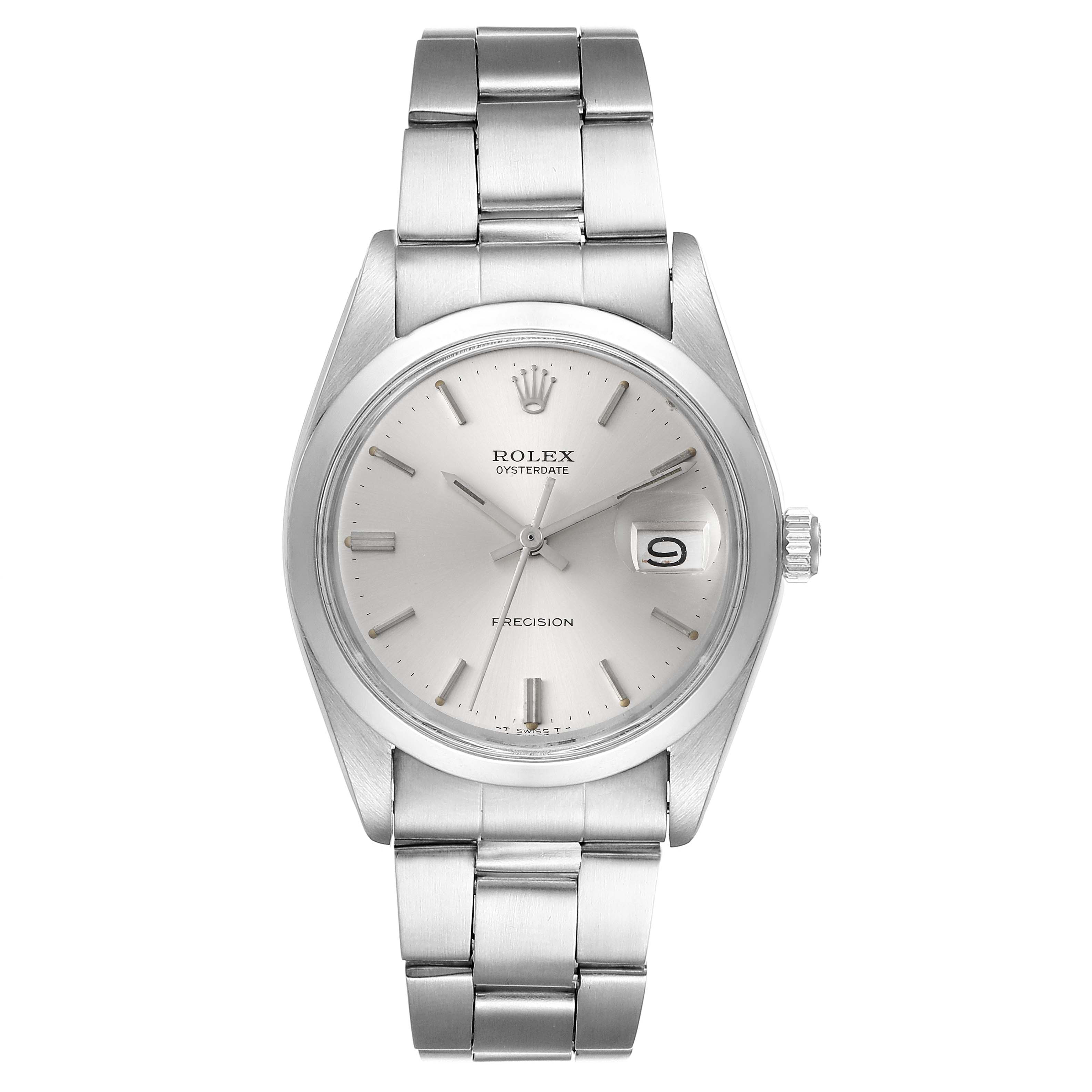 The image shows a front view of the Rolex Vintage Collection 6694 Men
s Stainless Steel Silver Dial 6694 Men
s Stainless Steel Silver Dial Oysterdate watch, highlighting its dial, bracelet, and date window.