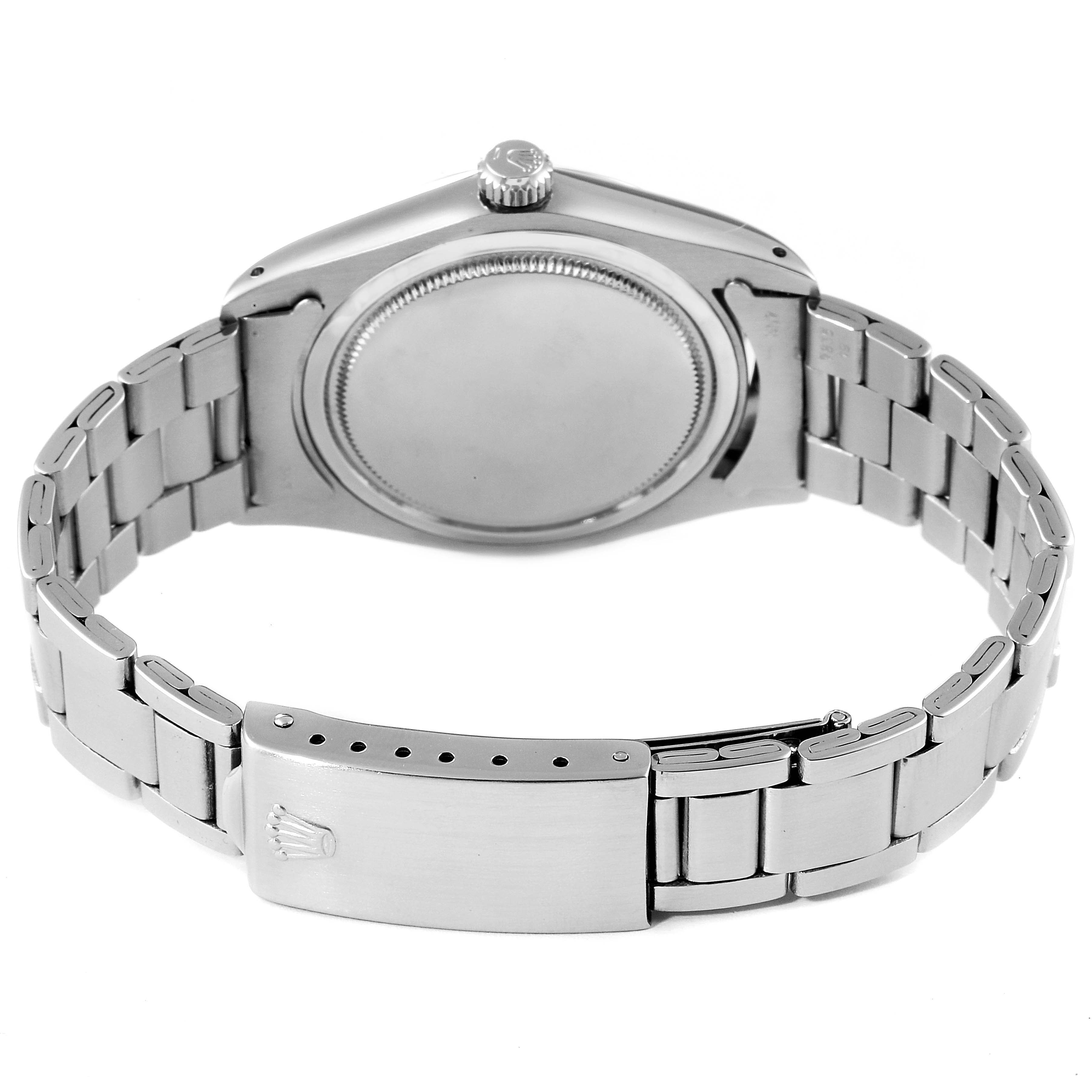 This image shows the back case and metal bracelet of the Rolex Vintage Collection 6694 Men
s Stainless Steel Silver Dial 6694 Men
s Stainless Steel Silver Dial model from a rear angle.