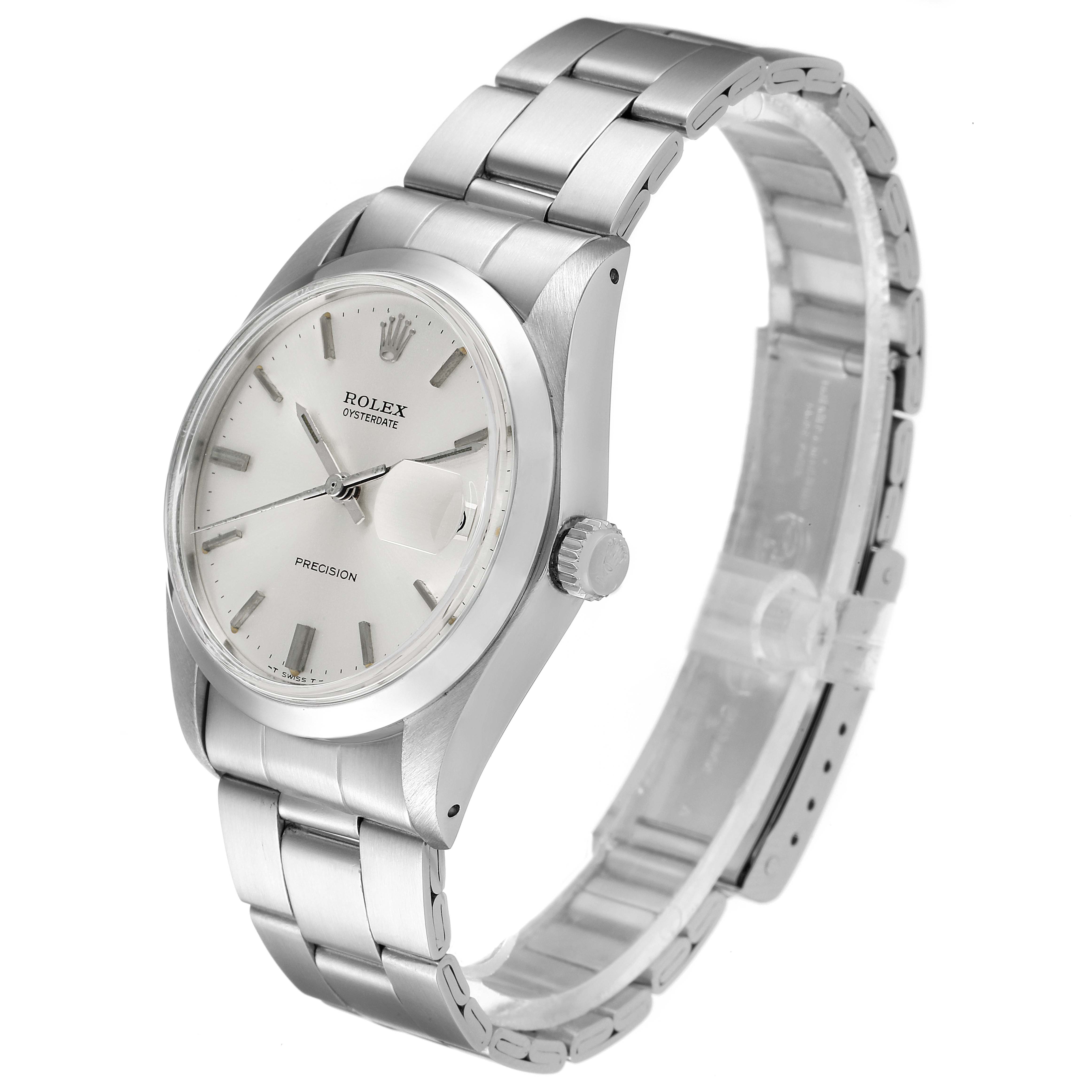 The watch is at a 3/4 angle, showing the face, bracelet, and crown of the Rolex Vintage Collection 6694 Men
s Stainless Steel Silver Dial 6694 Men
s Stainless Steel Silver Dial model.