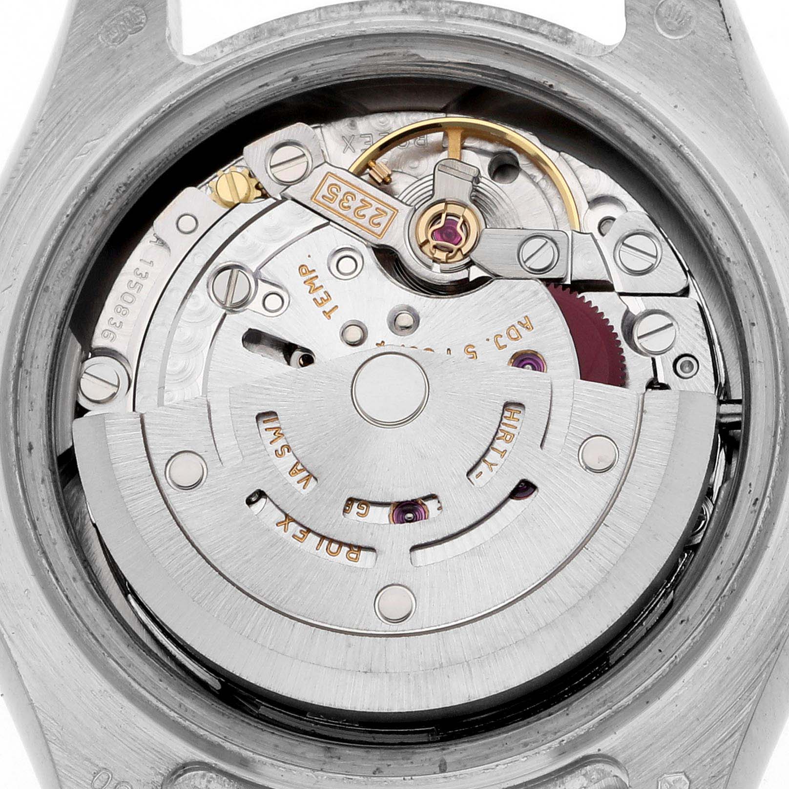 The image shows the movement of a Rolex Pearlmaster 80299 Women
s White Gold Mother of Pearl Dial 80299 Women
s White Gold Mother of Pearl Dial, viewed from the back with internal components visible.
