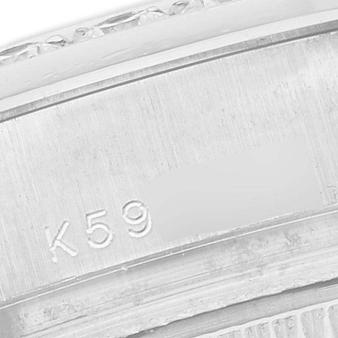 The image shows a close-up of the Rolex Pearlmaster 80299 Women
s White Gold Mother of Pearl Dial 80299 Women
s White Gold Mother of Pearl Dial’s inner case with engraved numbers.
