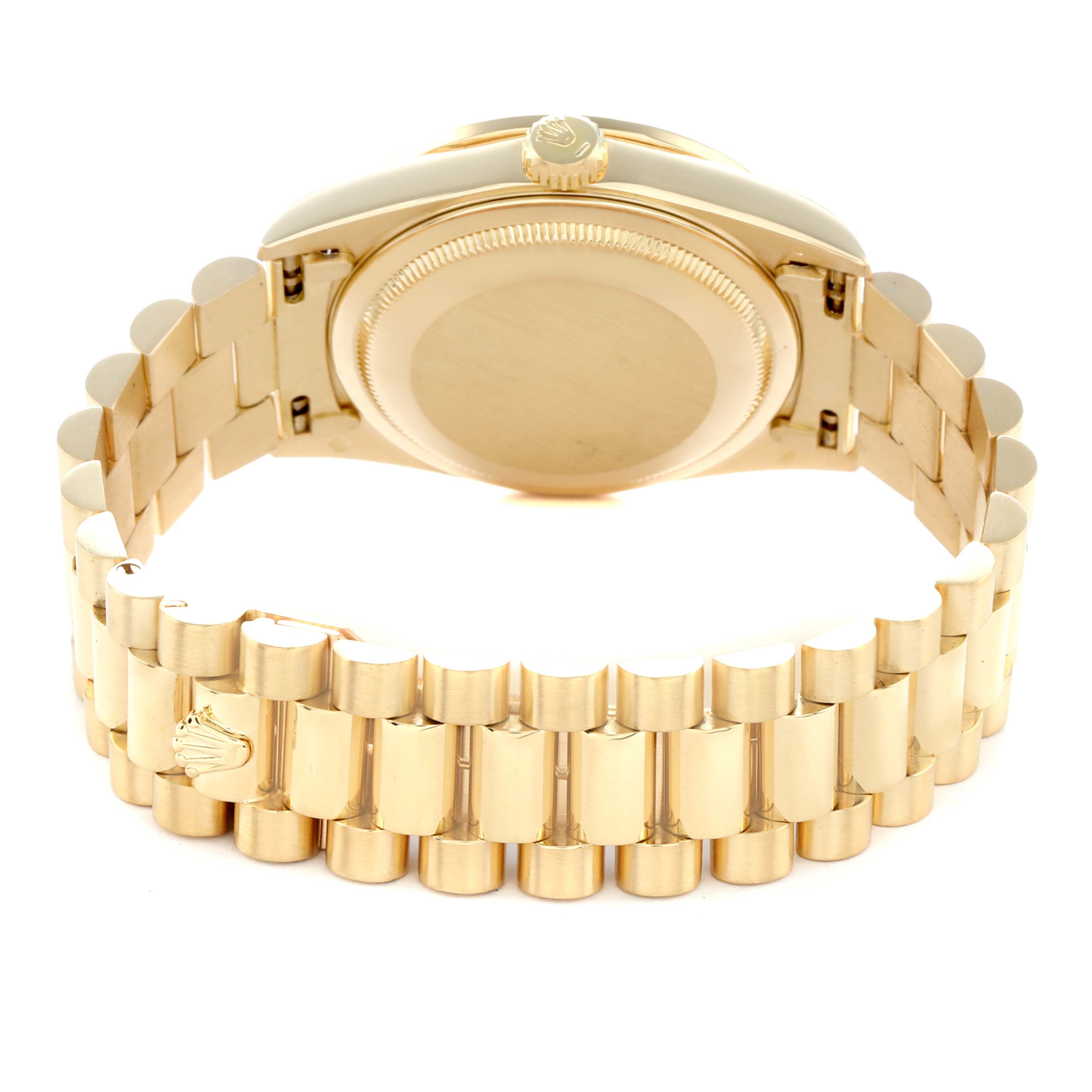 The Rolex President 18348 Men
s Yellow Gold Champagne Dial model is shown from the back, highlighting the case and signature bracelet with emblem.