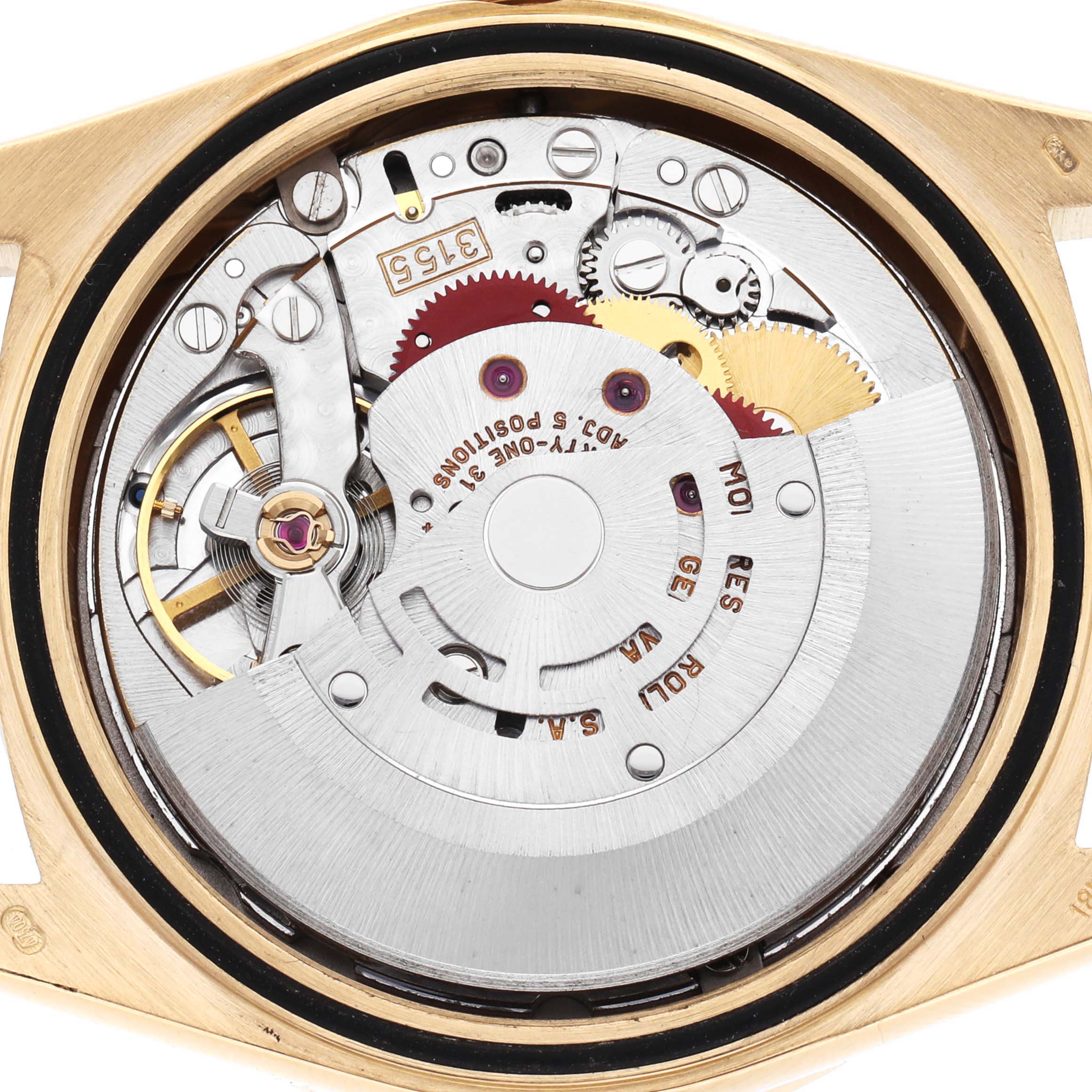 The image shows the internal movement mechanism of a Rolex President 18348 Men
s Yellow Gold Champagne Dial model watch viewed from the back.
