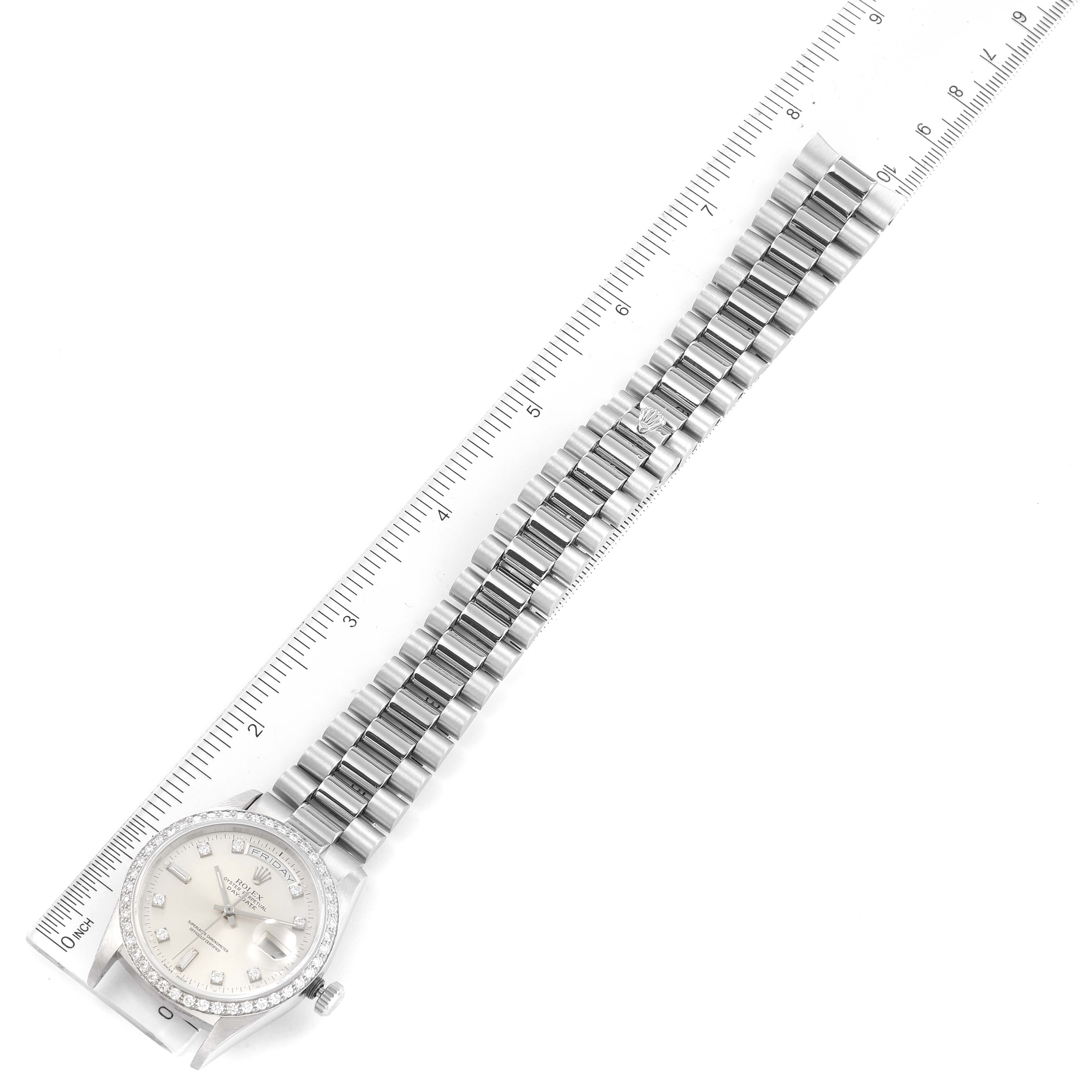 The image shows the Rolex President 18346 Men's Platinum Silver Dial 18346 Men's Platinum Silver Dial model watch laying flat, with a ruler beside it for scale.