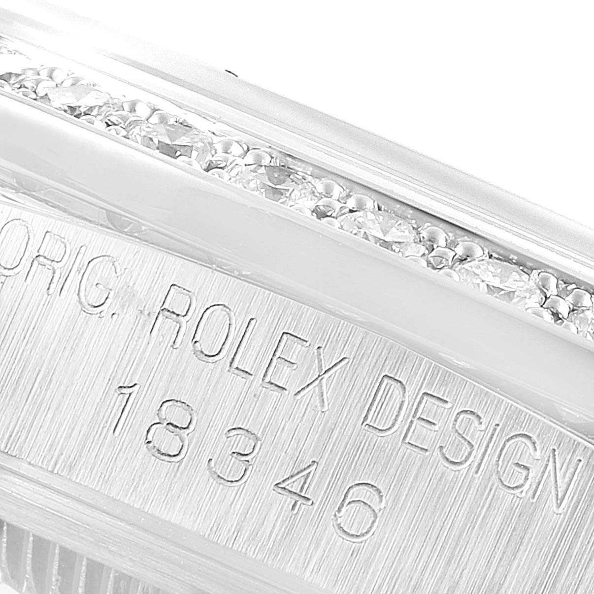 This image shows a close-up of the engraved model number "18346" on the bezel of a Rolex President 18346 Men's Platinum Silver Dial 18346 Men's Platinum Silver Dial watch.