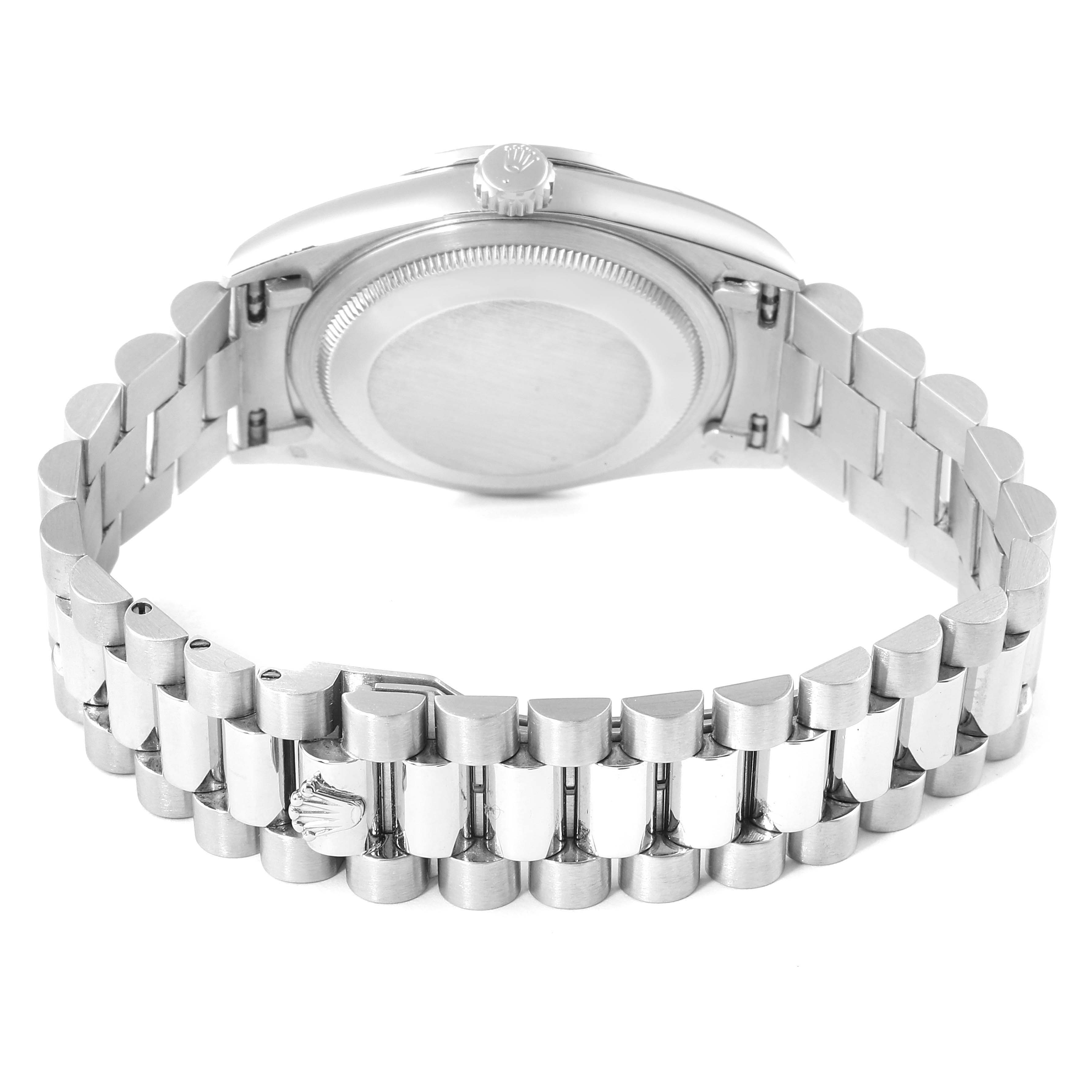 The image shows the back of a Rolex President 18346 Men's Platinum Silver Dial 18346 Men's Platinum Silver Dial model watch, highlighting the case back and bracelet with the crown logo.