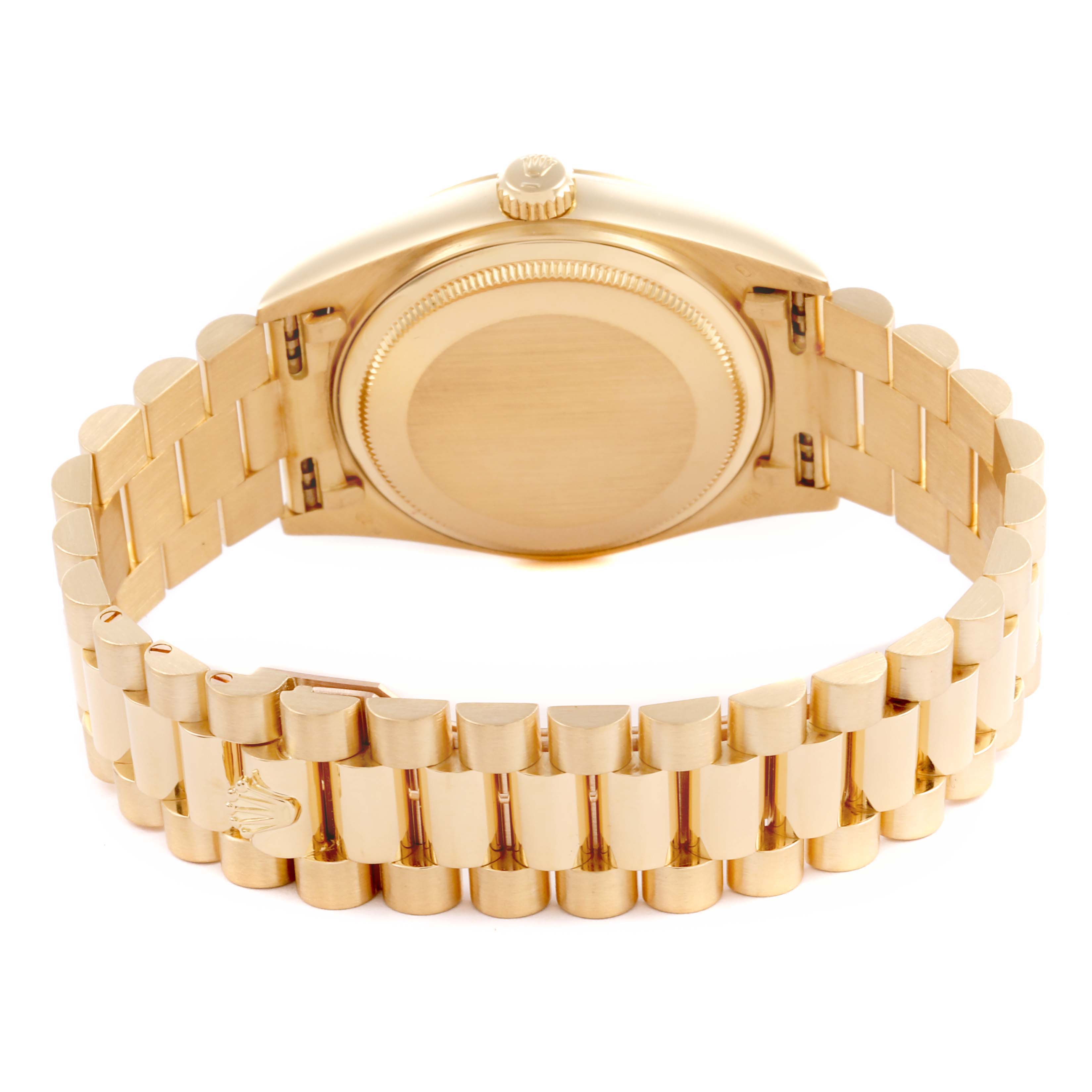 The image shows the back case and bracelet of the Rolex President 18038 Men
s Yellow Gold Champagne Dial 18038 Men
s Yellow Gold Champagne Dial model watch, highlighting its clasp and links.