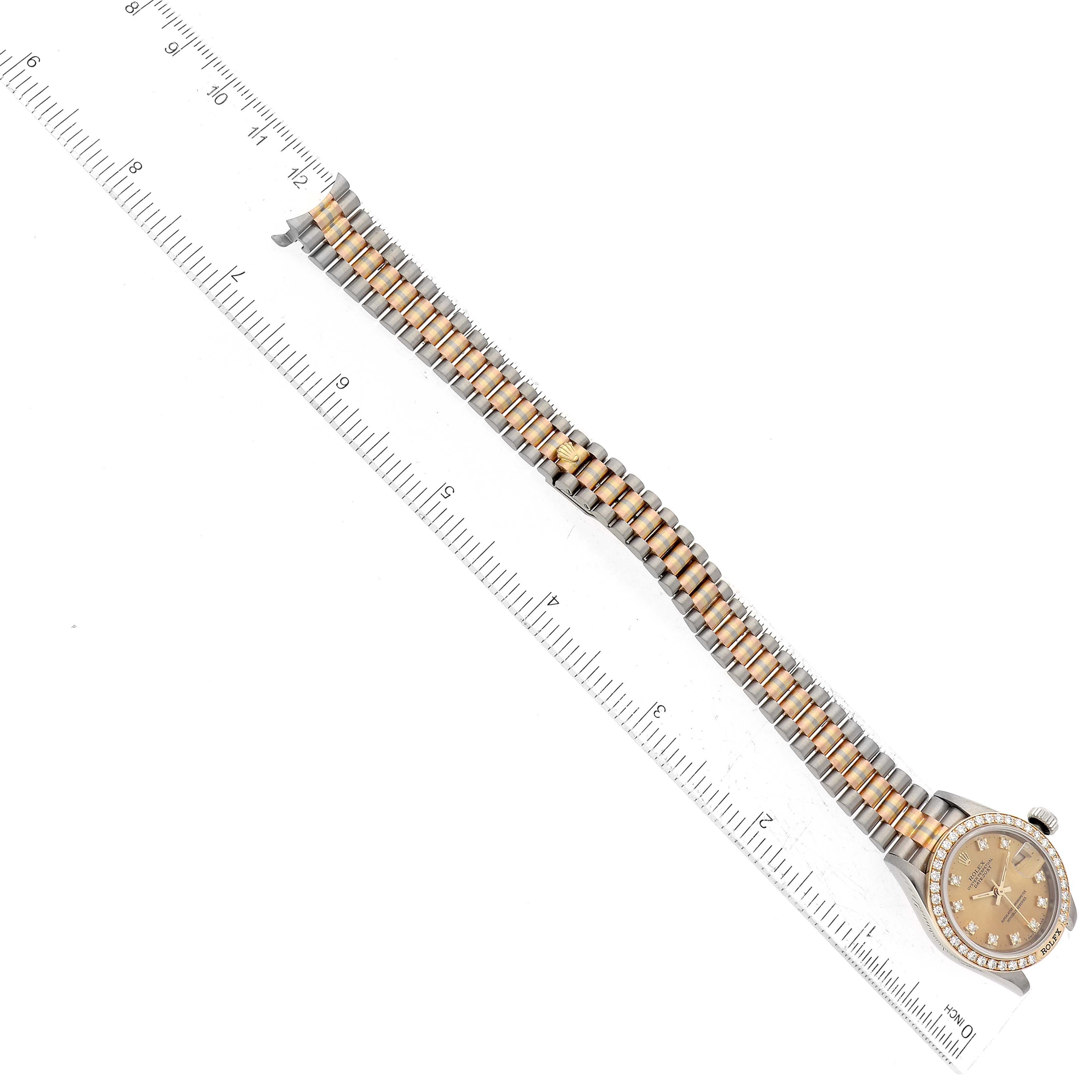 The Rolex President 69149 Women's White Gold Champagne Dial watch is shown in a top-down view with its dial, bracelet, and partial side profile visible.