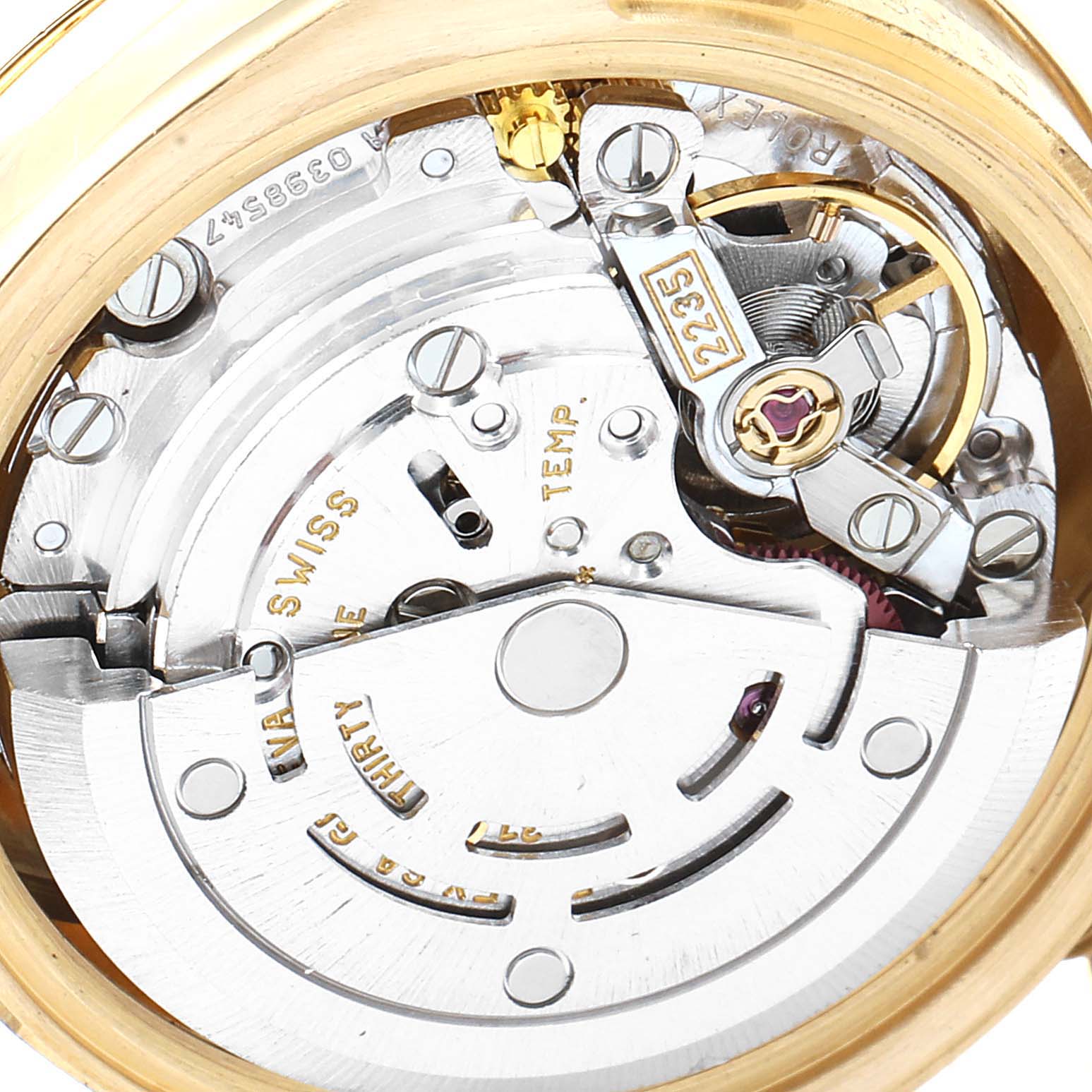 This is a close-up view of the movement inside a Rolex President 179158 Women's Yellow Gold Champagne Dial 179158 Women's Yellow Gold Champagne Dial model watch, showing gears and mechanical parts.