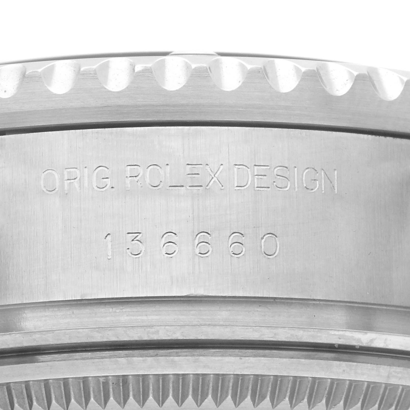 The image shows the side profile of a Rolex Sea-Dweller 136660 Men's Stainless Steel Black Dial 136660 Men's Stainless Steel Black Dial watch bezel with engraved design details.