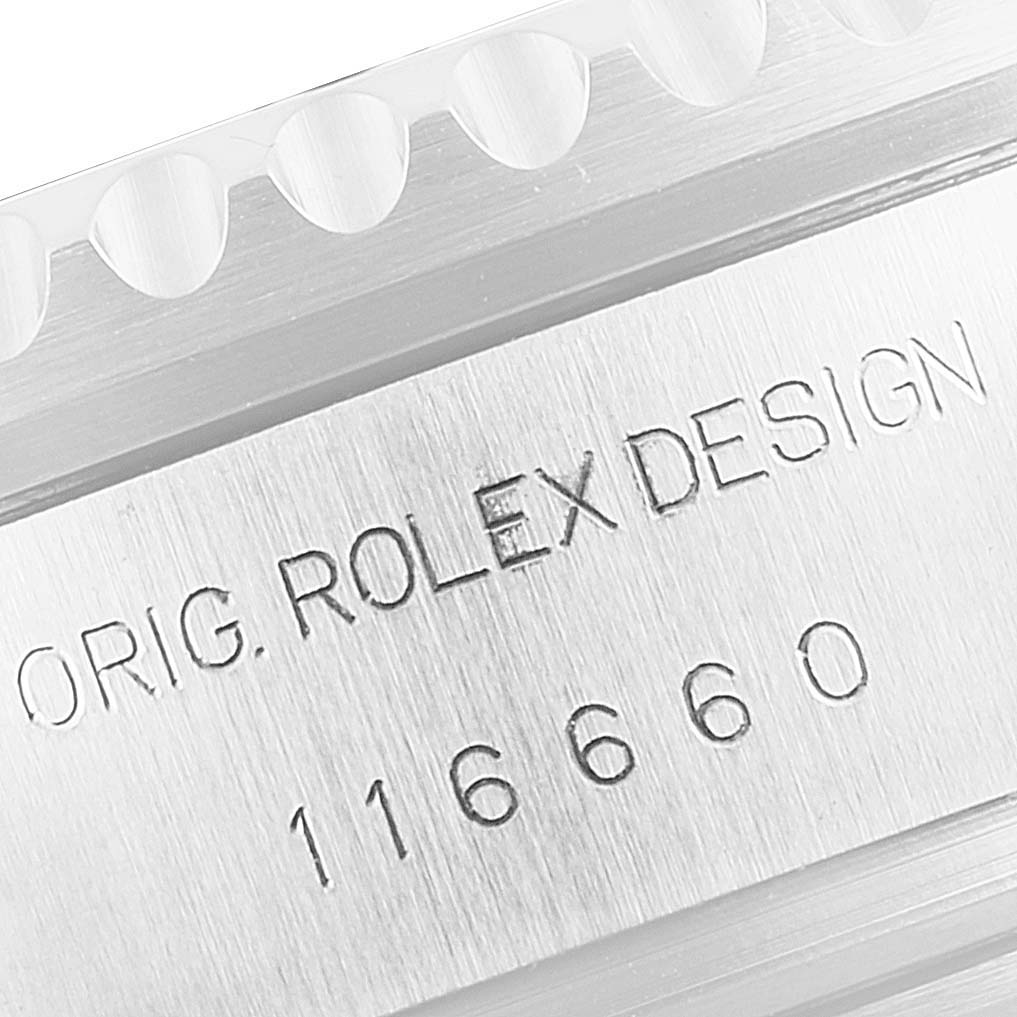 The image shows a close-up of the Sea-Dweller model by Rolex, focusing on the engraved design and model number on the case side.