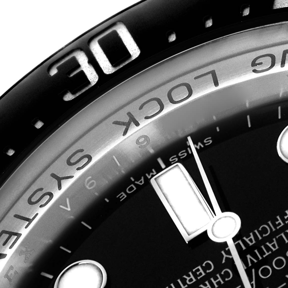 The image shows a close-up of the bezel and dial of the Rolex Sea-Dweller 116660 Men
s Stainless Steel Black Dial, highlighting the "30" marker and part of the face.