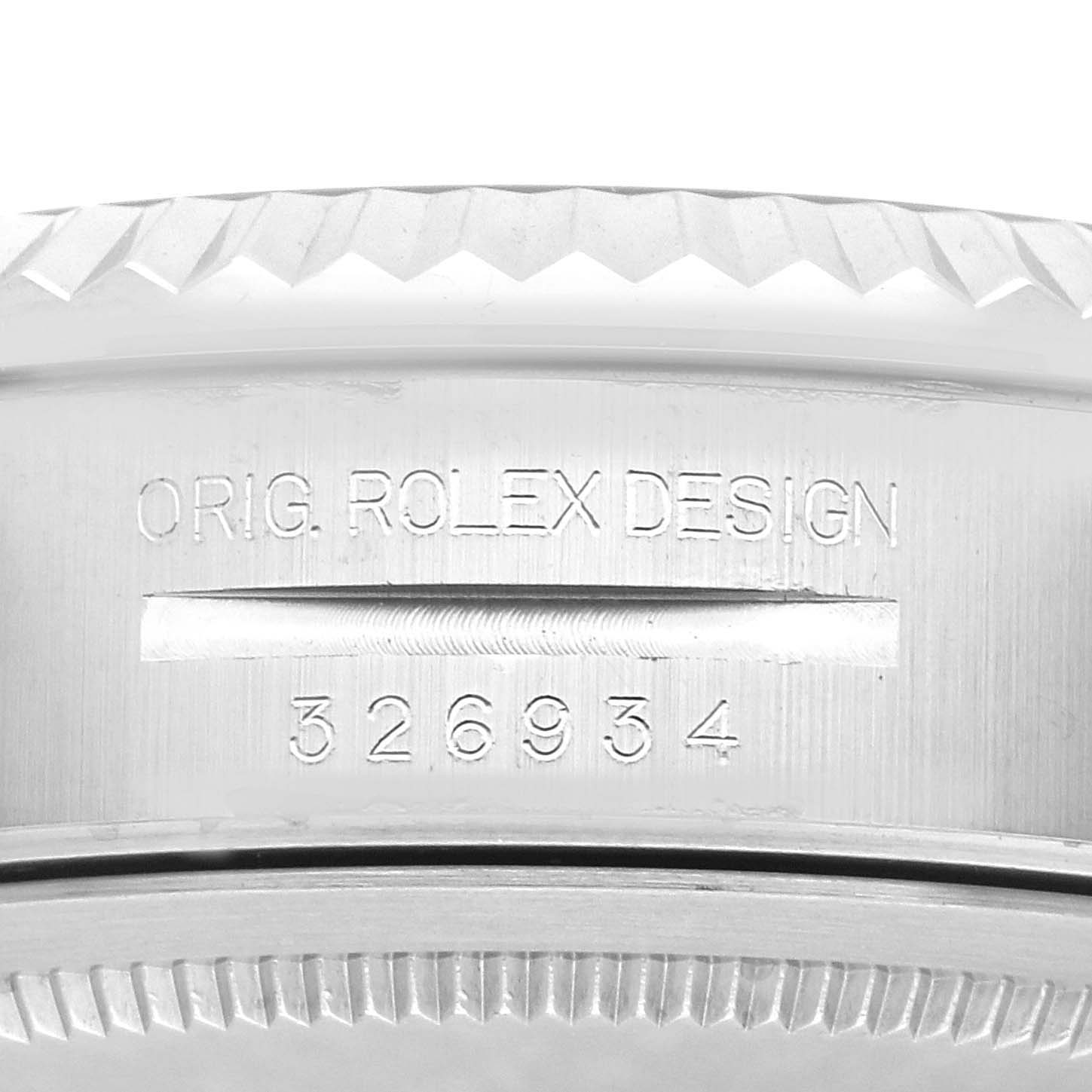 The image shows a close-up of the Rolex Sky-Dweller 326934 Men
s Stainless Steel Blue Dial
s case side, displaying the model number and "ORIG. ROLEX DESIGN" engraving.