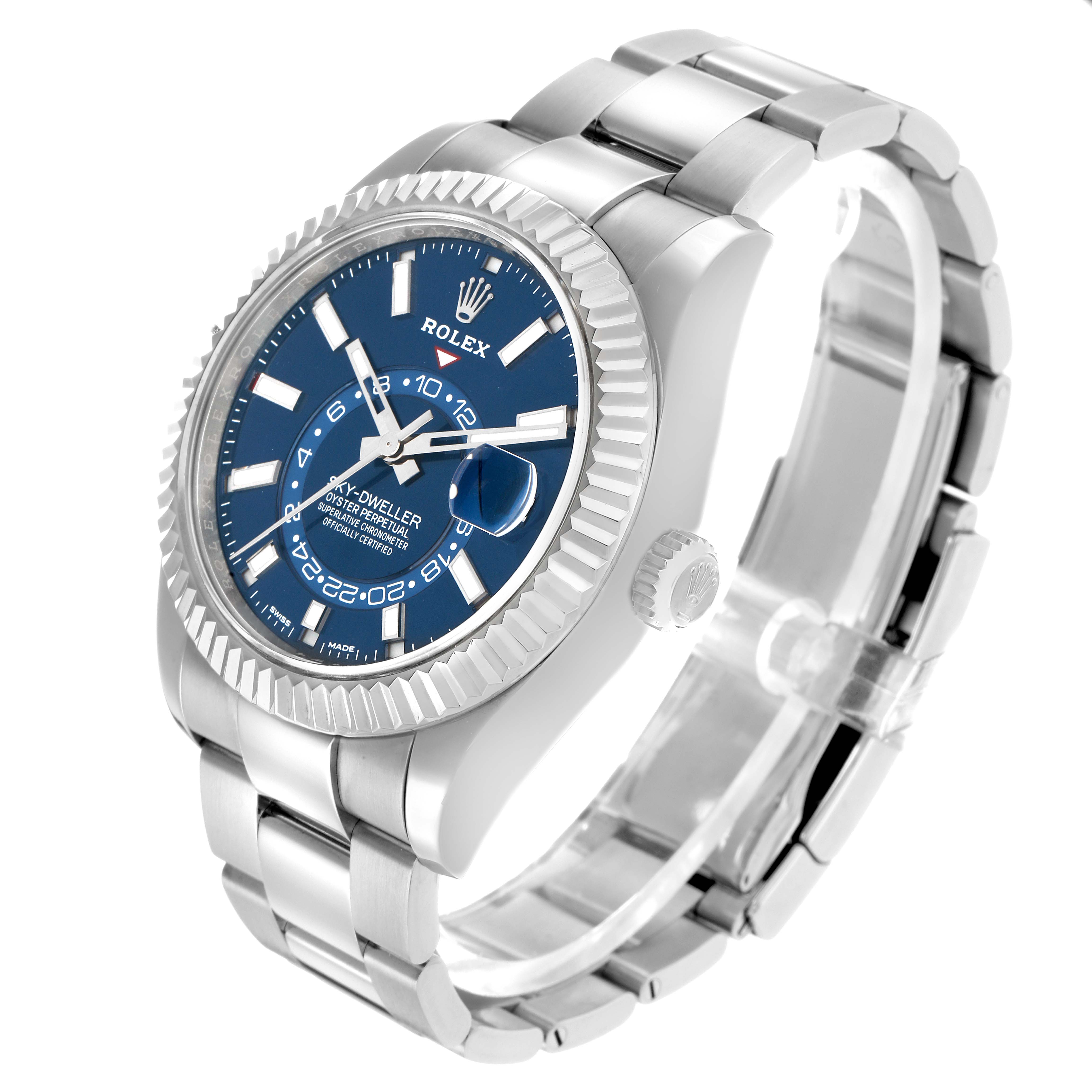 The Rolex Sky-Dweller 326934 Men
s Stainless Steel Blue Dial watch is shown at a slight angle, highlighting the face, bezel, crown, bracelet, and clasp.